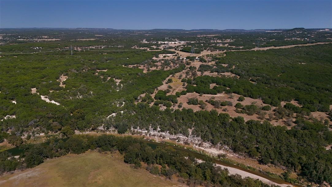 Aerial view of property's location with a heavily