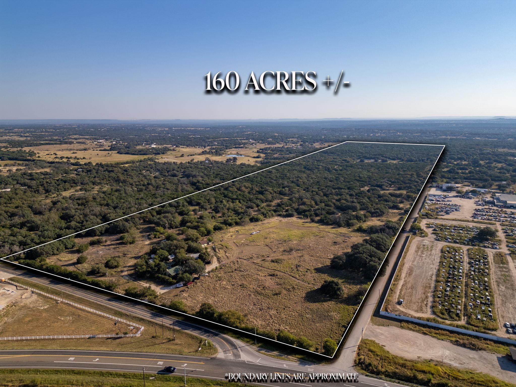 Aerial overview of property's location with prope