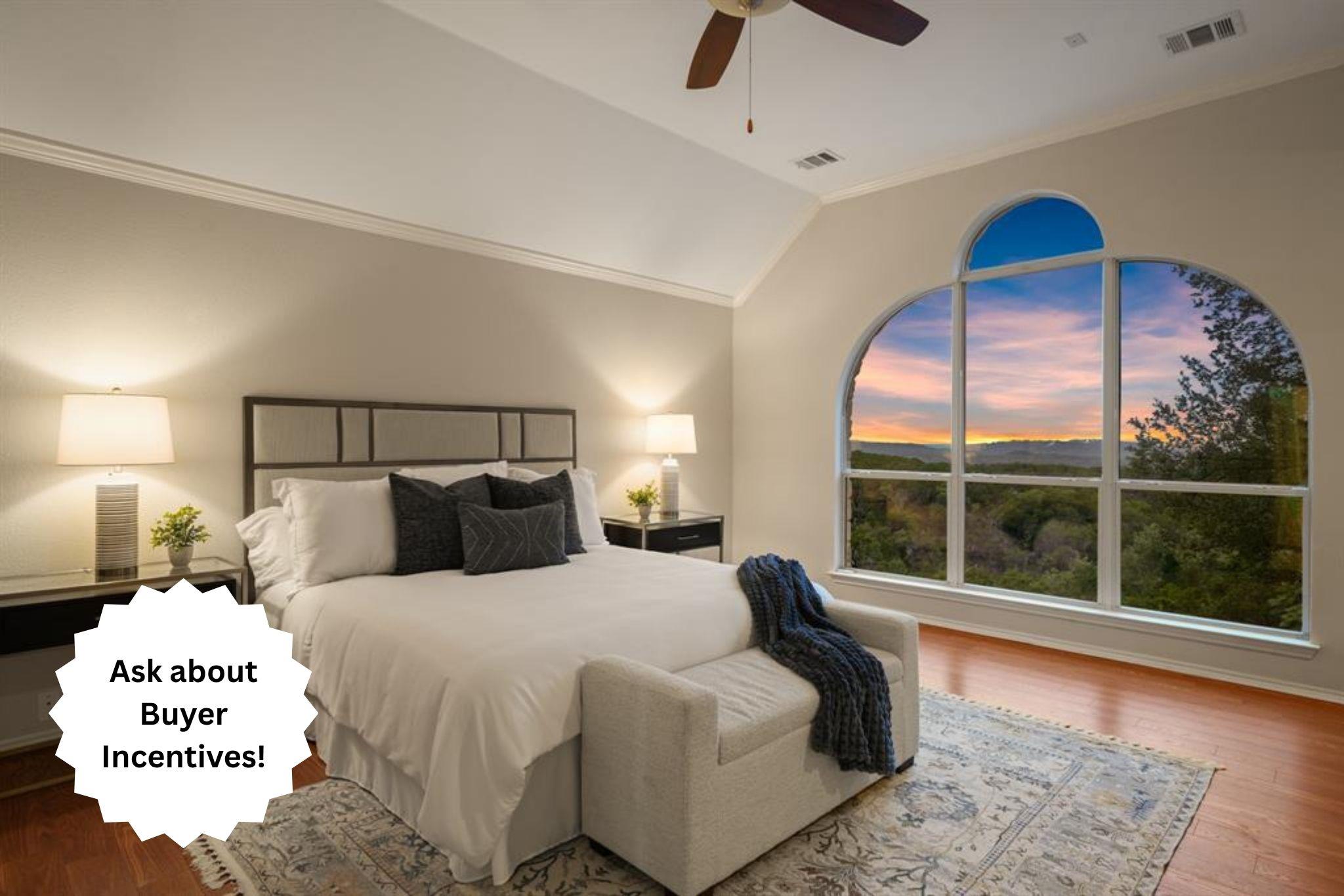 A dramatic arched window frames scenic treetop vi