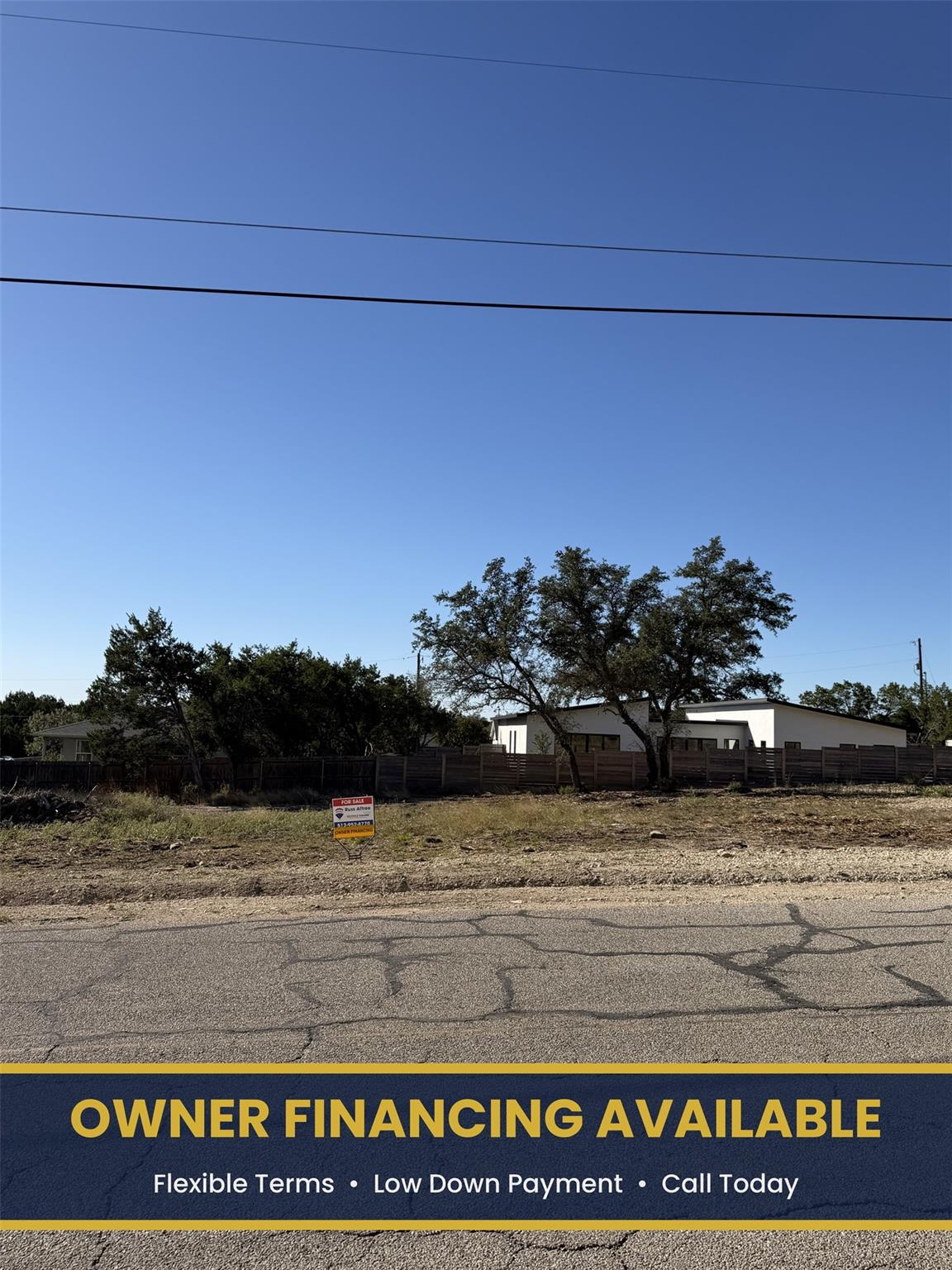 Expansive lot featuring mature trees and a partia