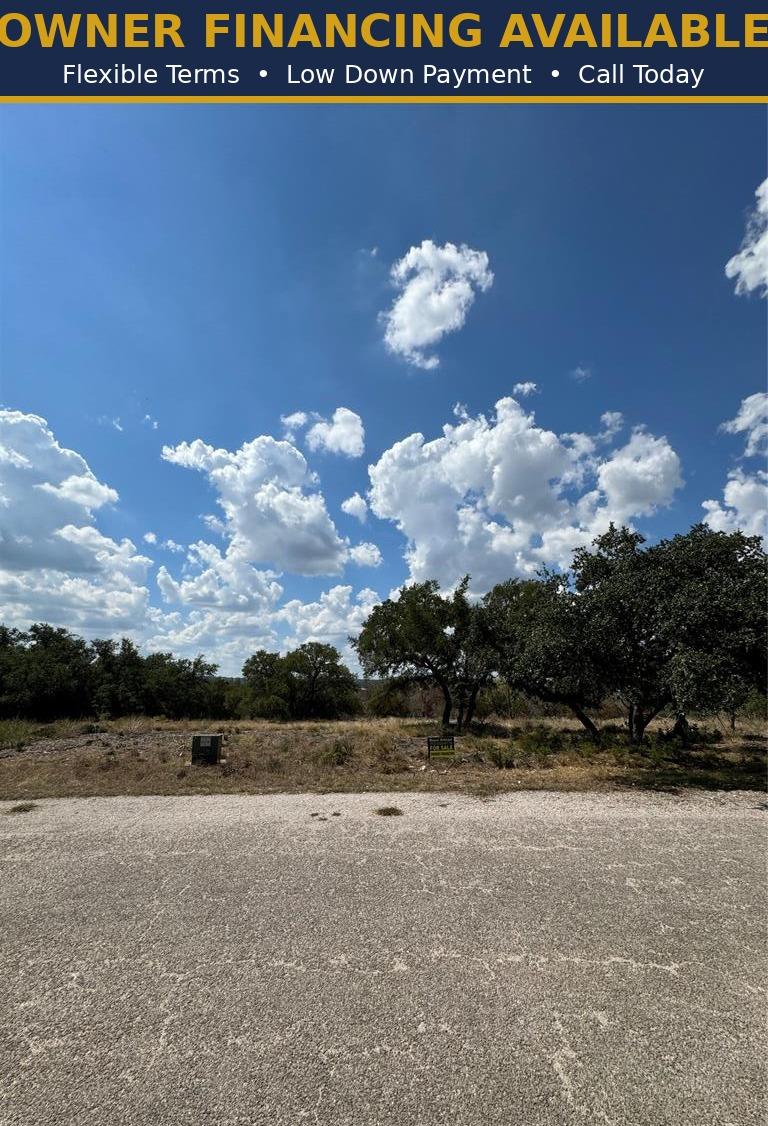A promising build site awaits amidst mature trees