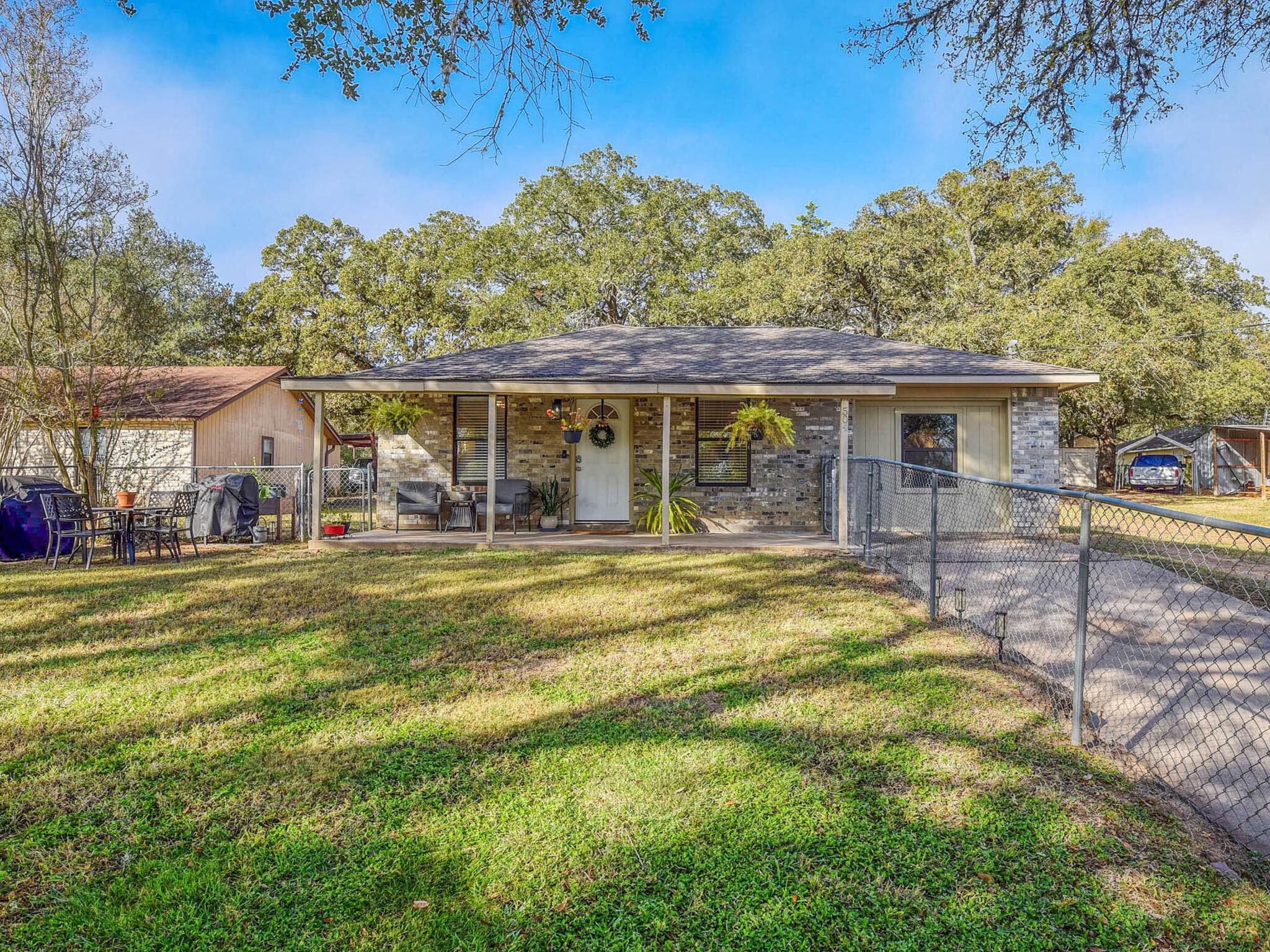 View of front of property featuring brick siding,