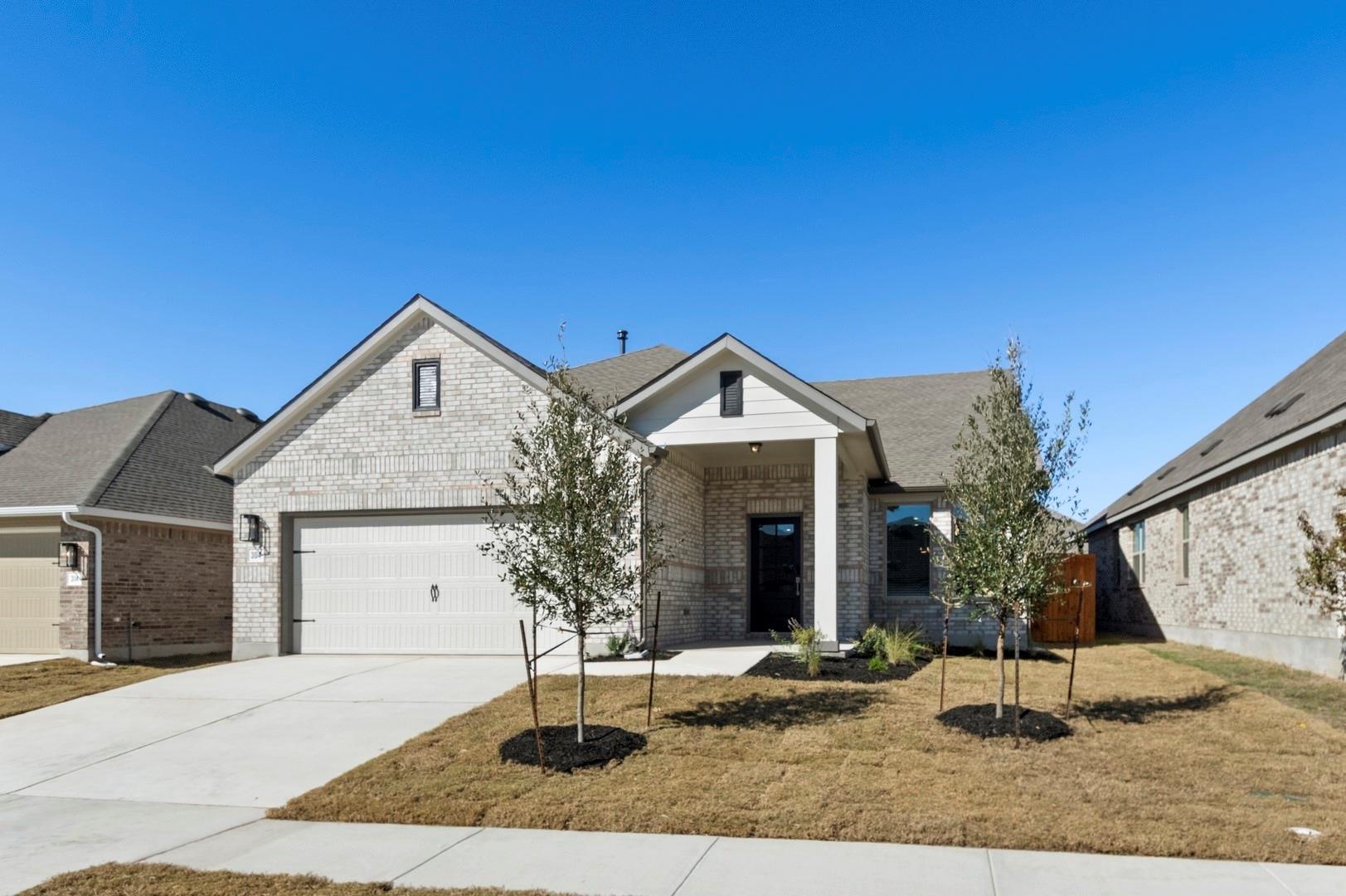 View of front of property featuring brick siding,