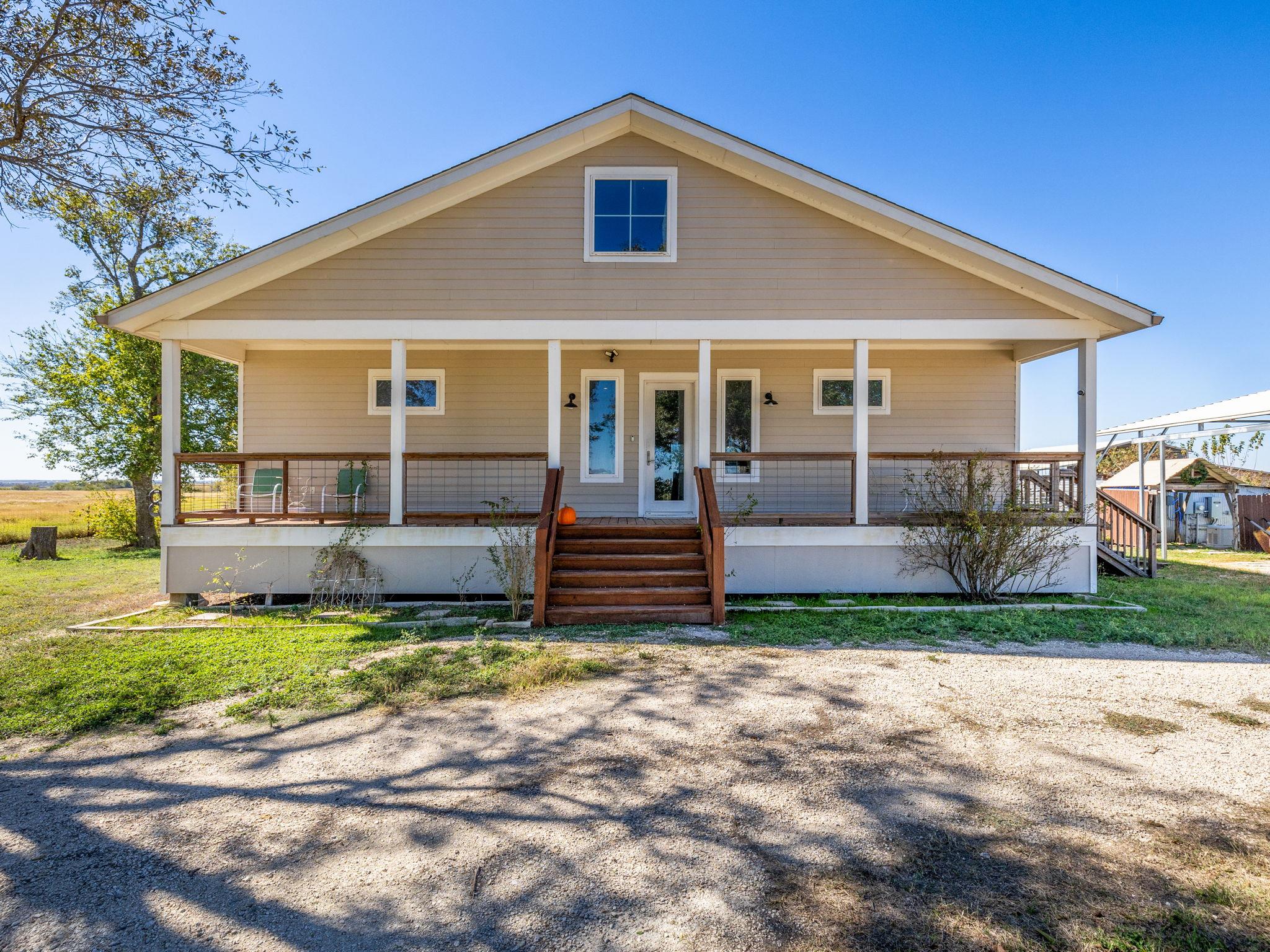 View of front of home with covered porch