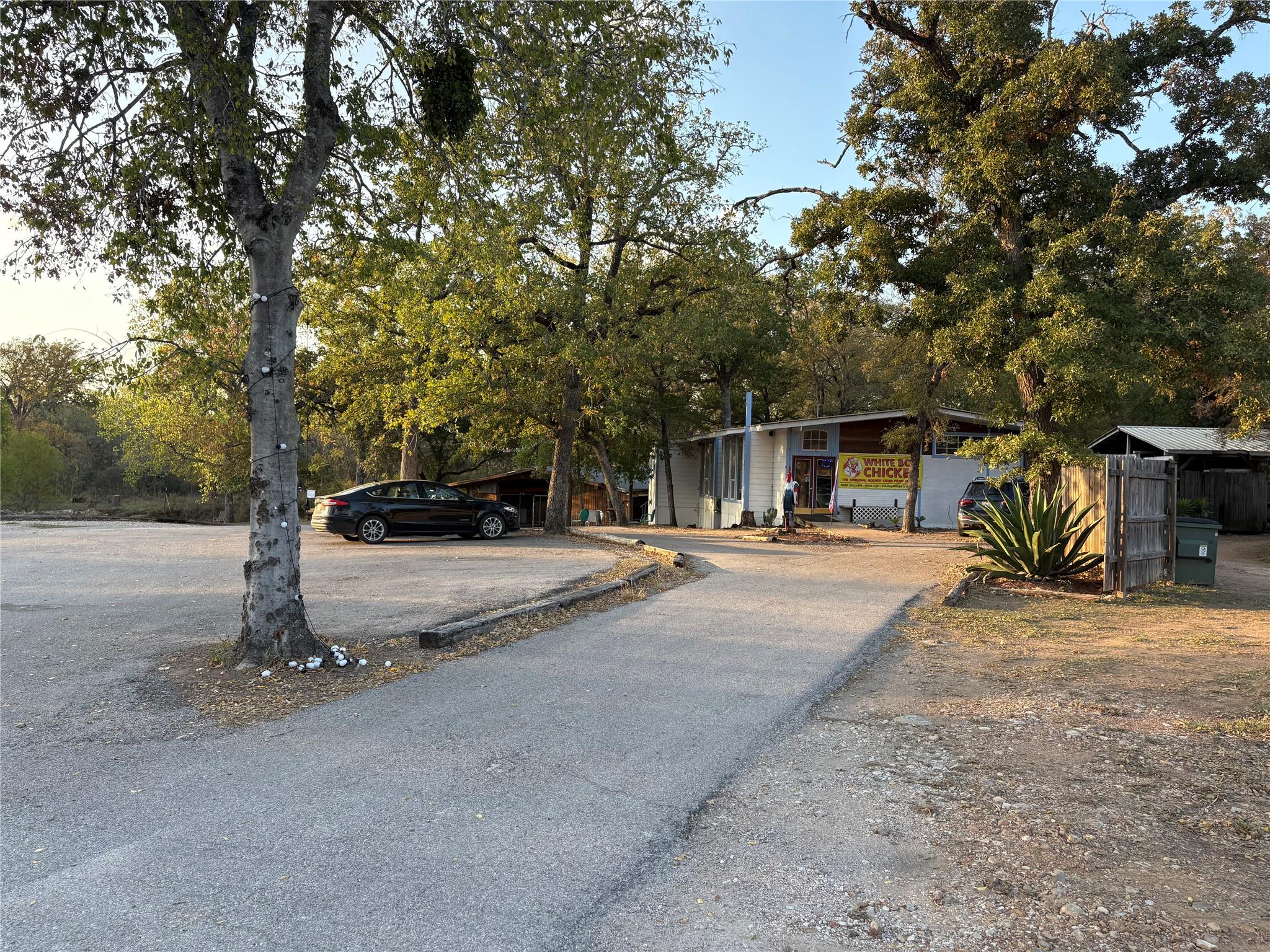 View of front facade featuring view of scattered 