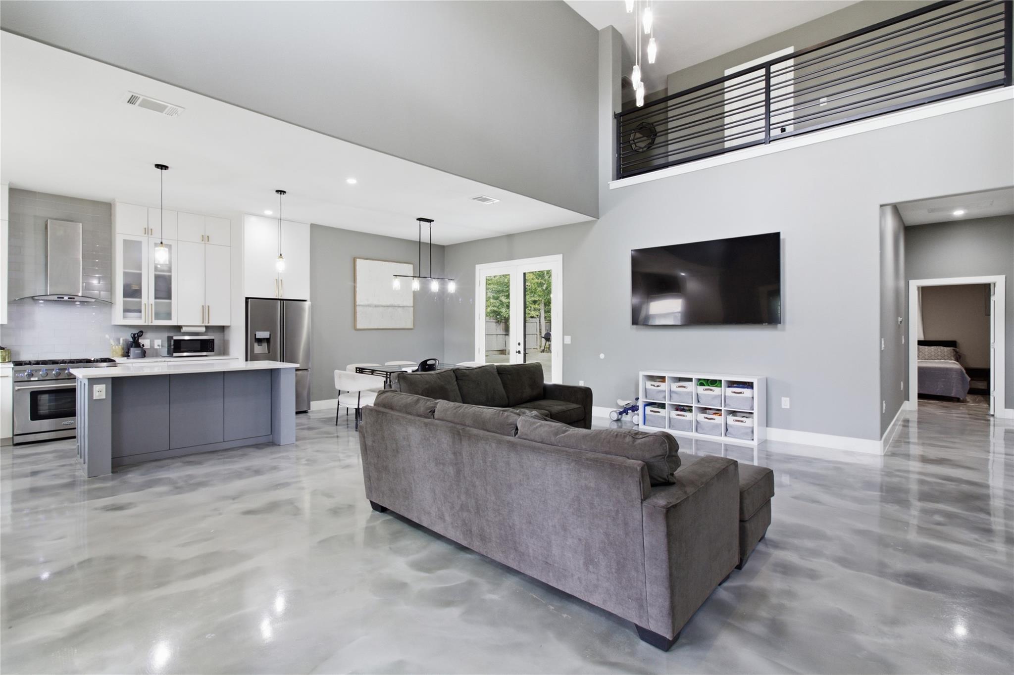 An open concept living area seamlessly connects t