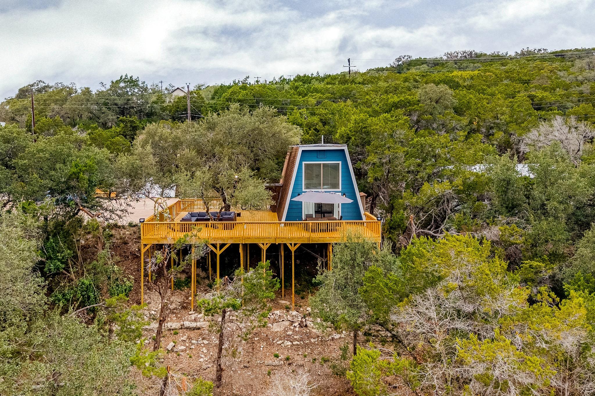 View of outdoor structure with a forest view