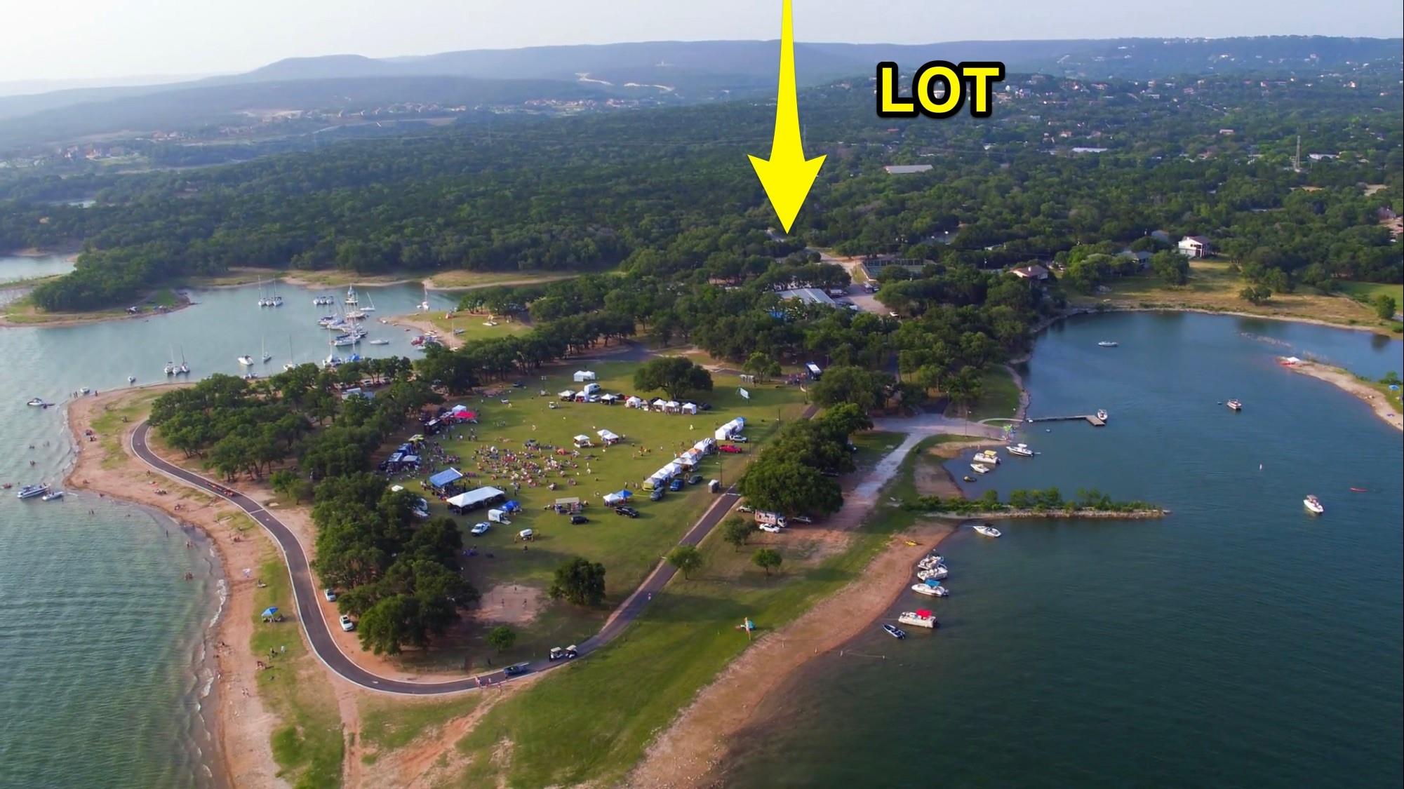 Aerial view of property's location with a large b
