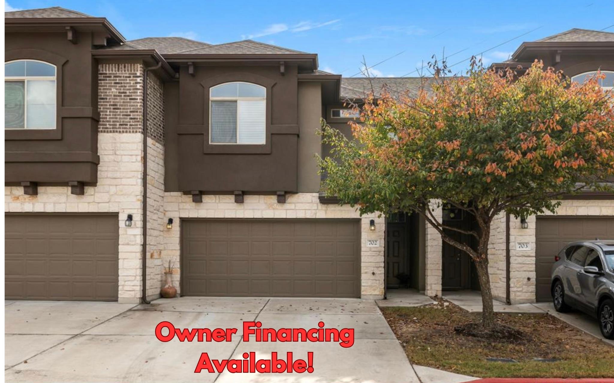 Single story home featuring concrete driveway, st