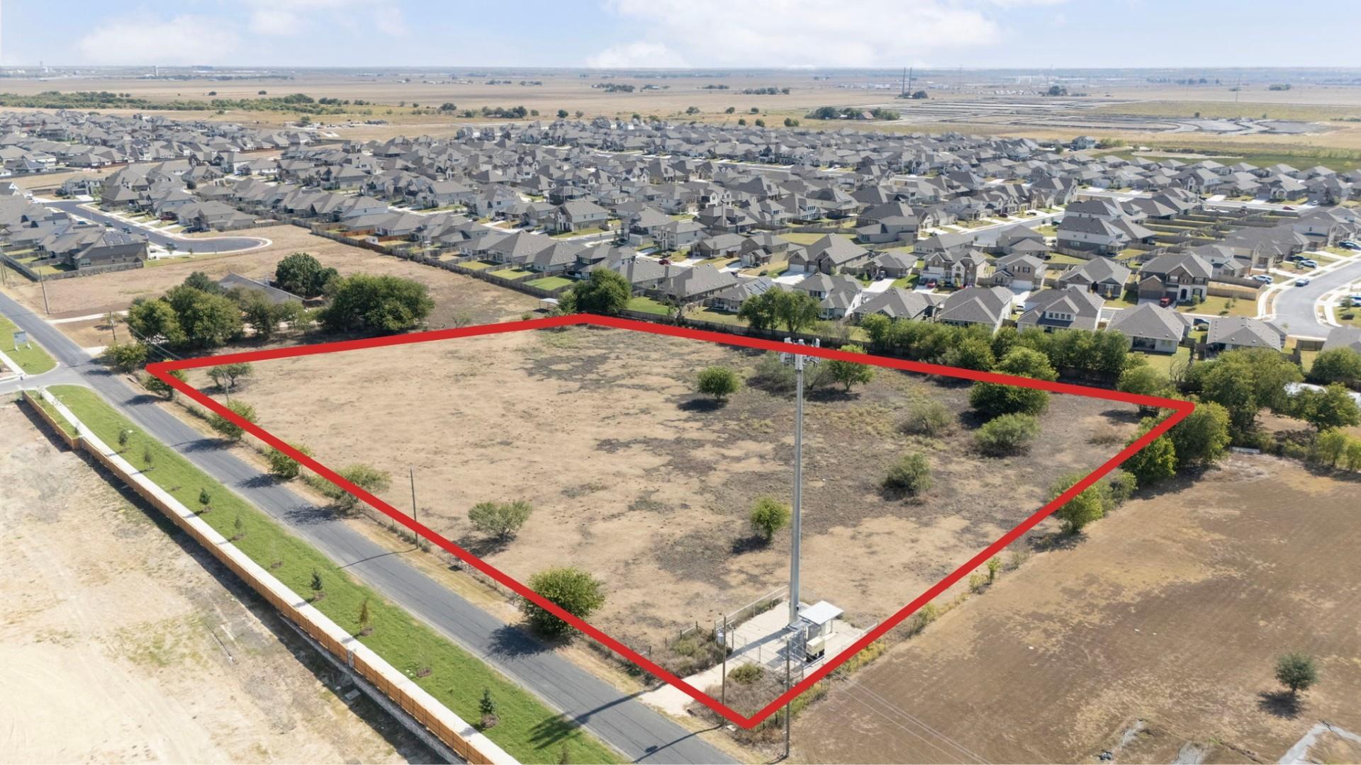 Aerial perspective of suburban area featuring pro