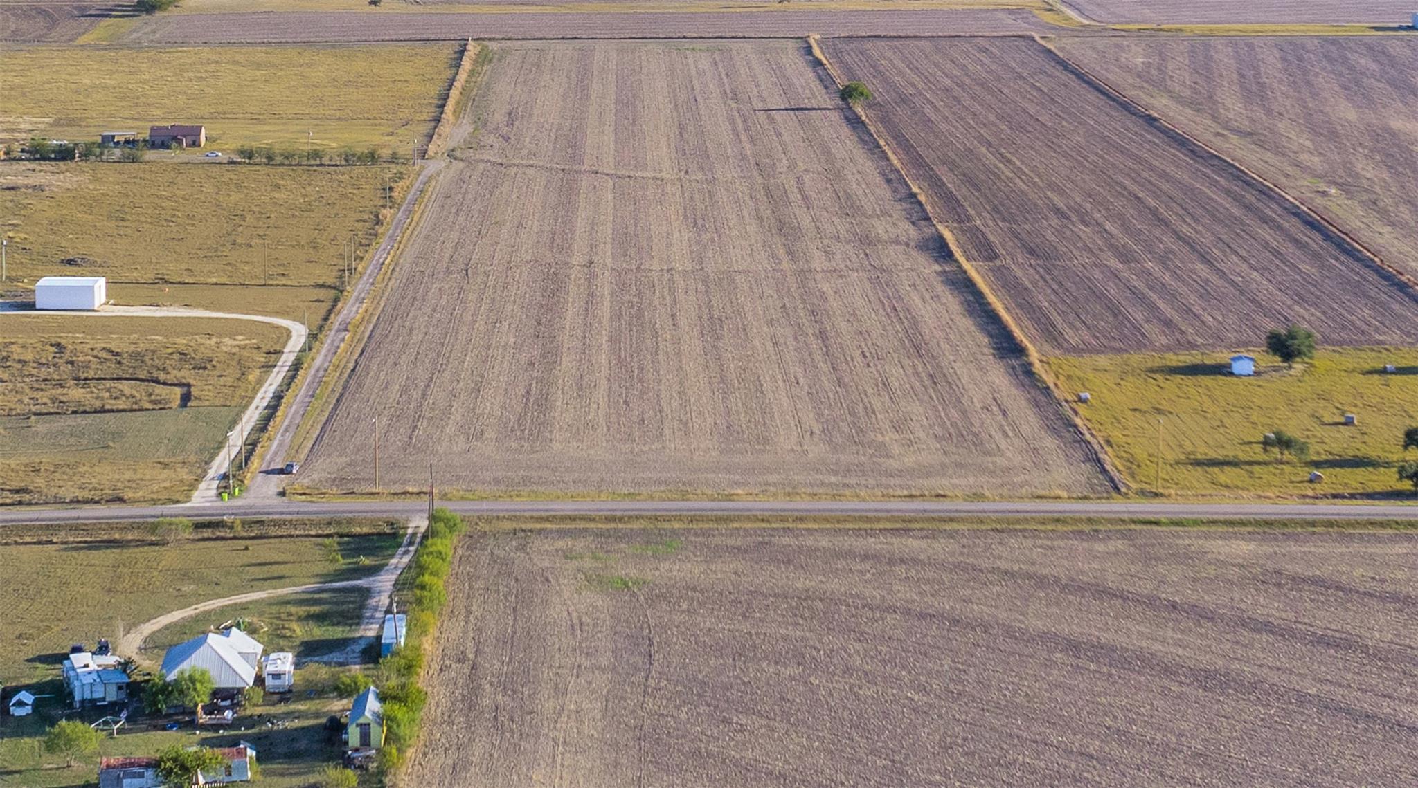 View of rural area with large plots for crops