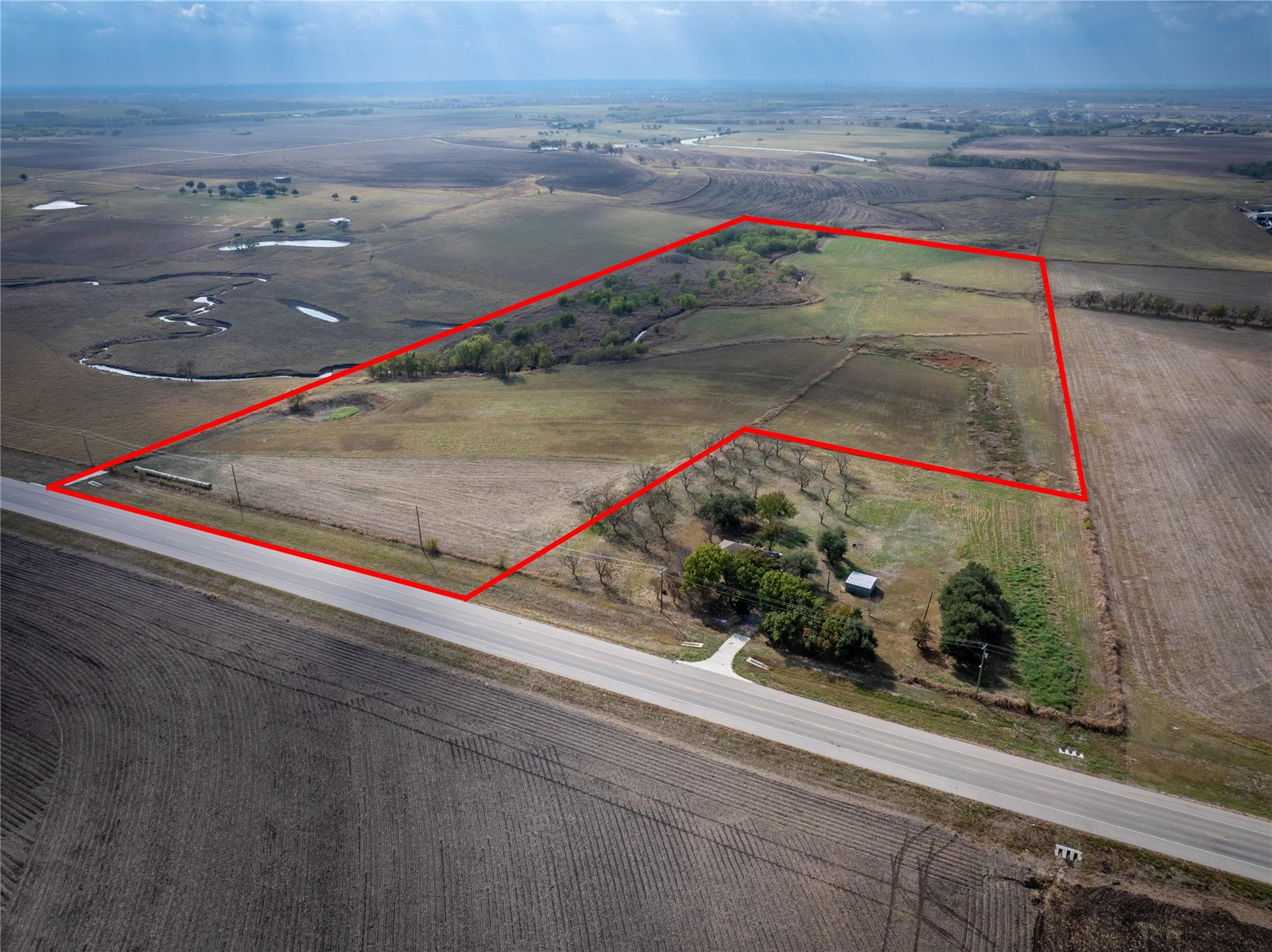 Aerial view of sparsely populated area featuring 