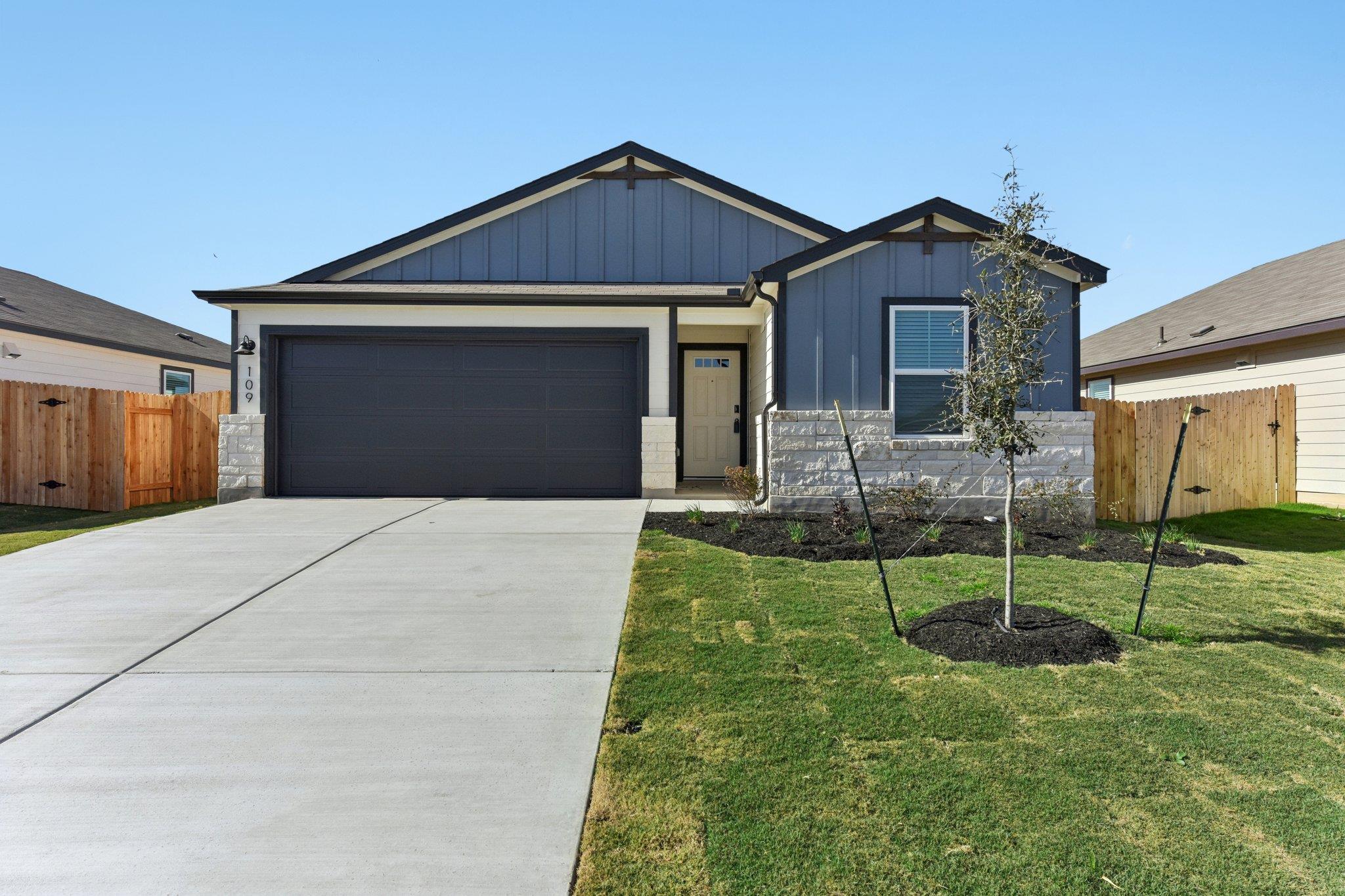 Craftsman-style home featuring board and batten s