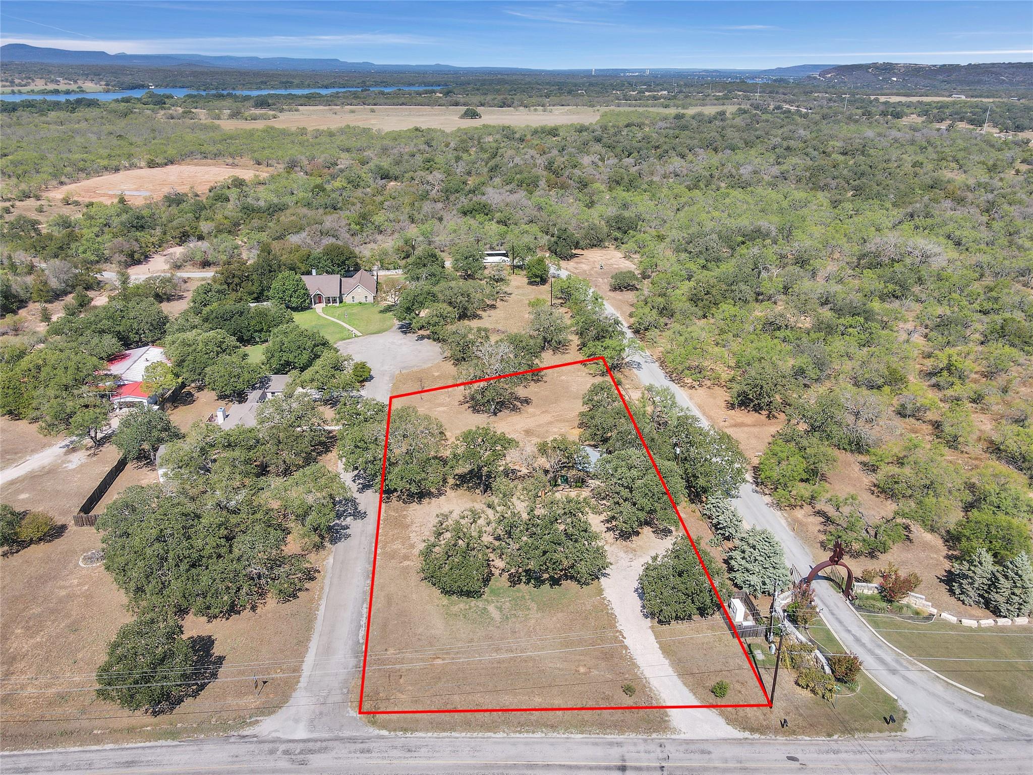 Aerial view of property's location featuring moun