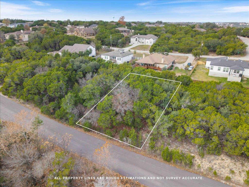 Aerial perspective of suburban area with property