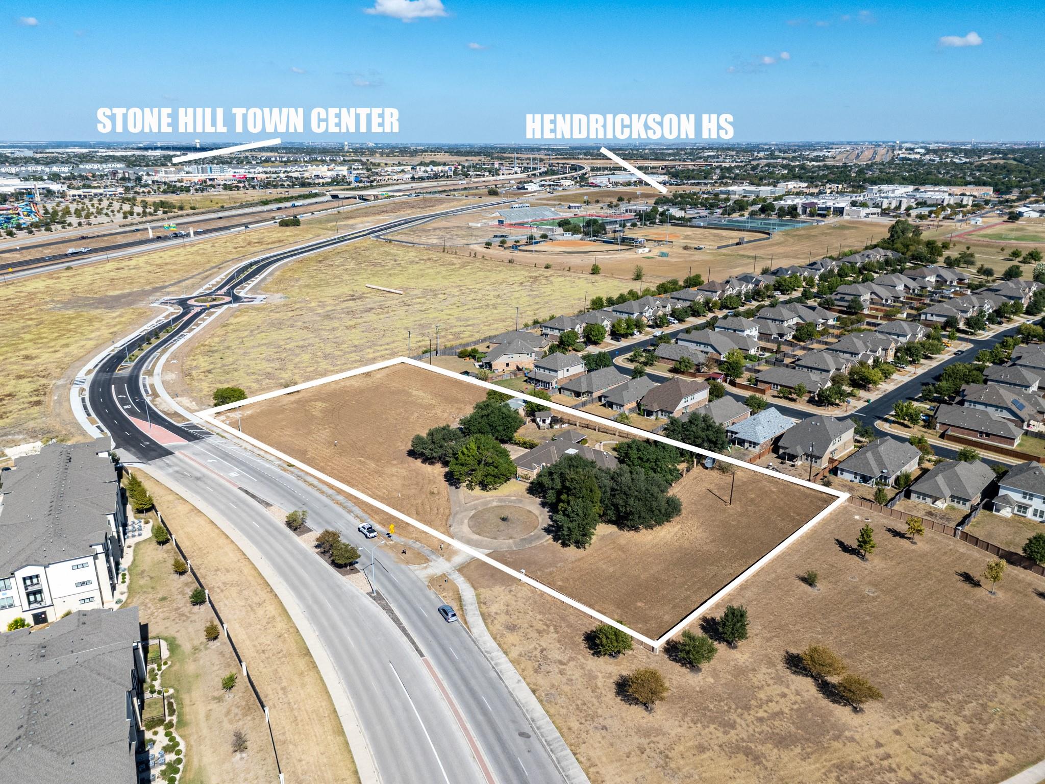 Aerial perspective of suburban area featuring pro