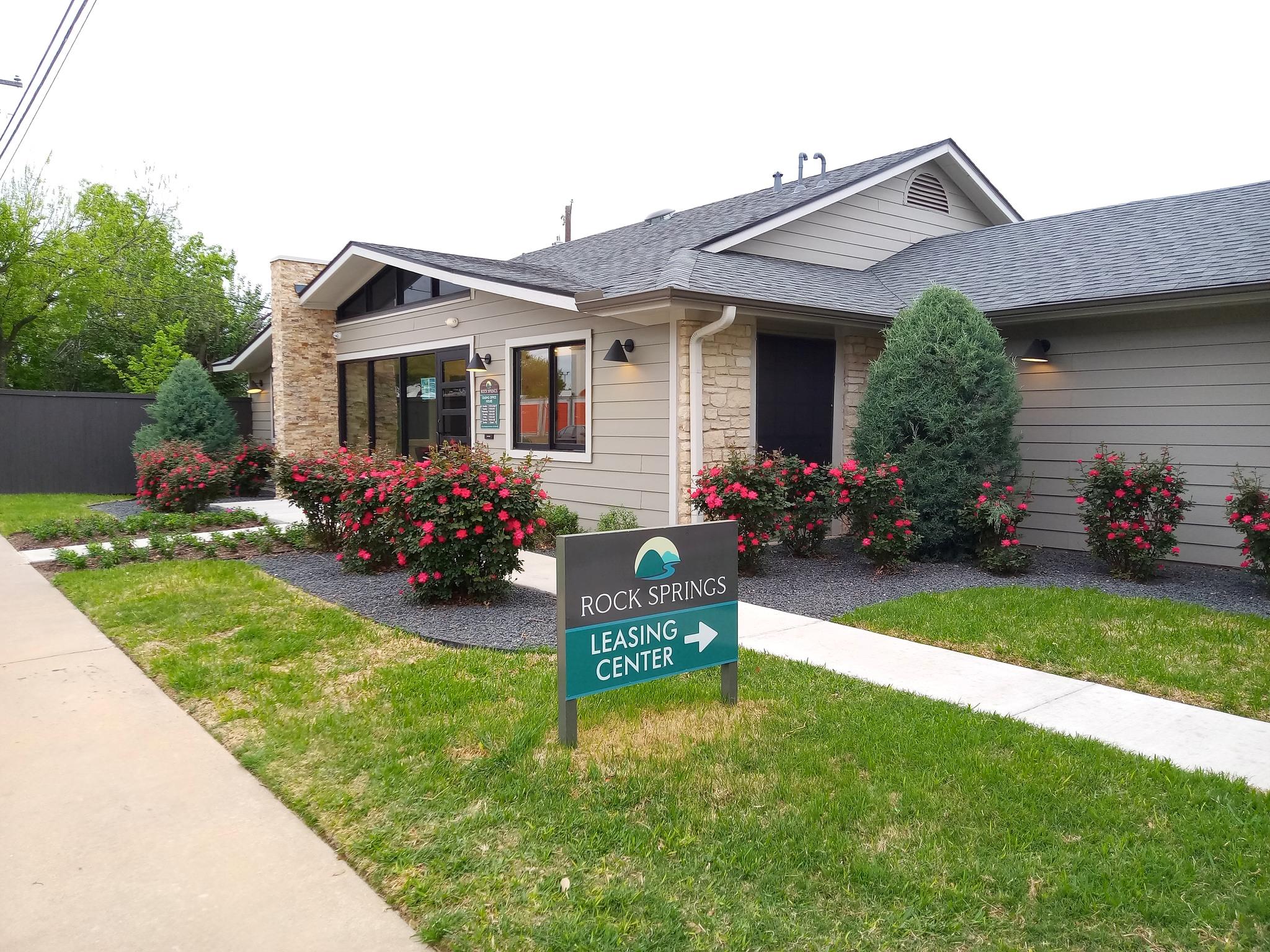 View of front of house featuring stone siding and