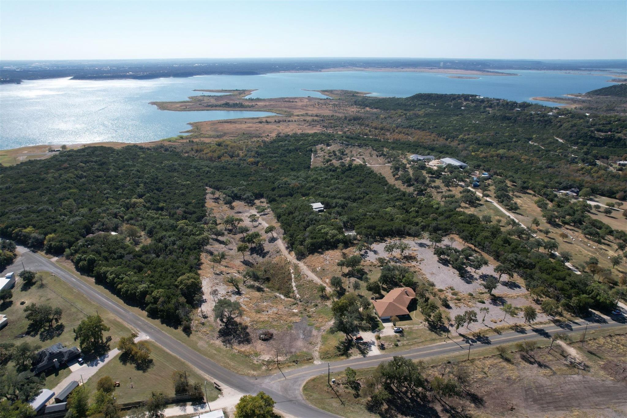 Aerial view of property and surrounding area with