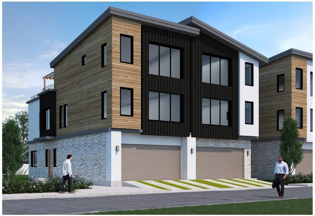 View of building exterior with an attached garage