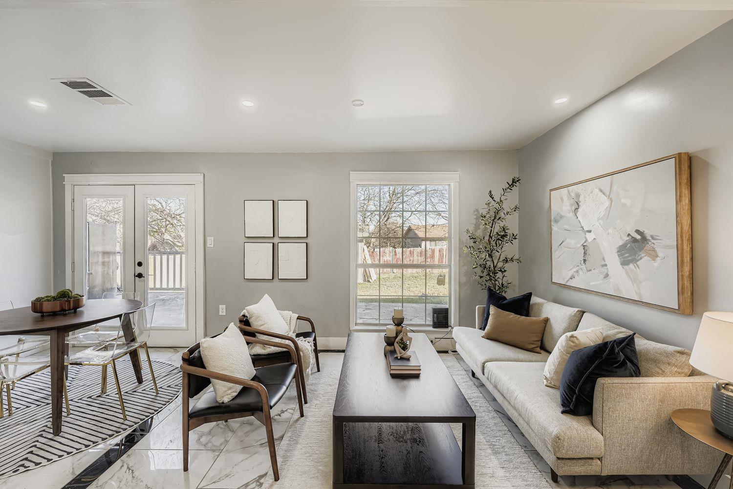 Living area with marble finish floors, healthy am