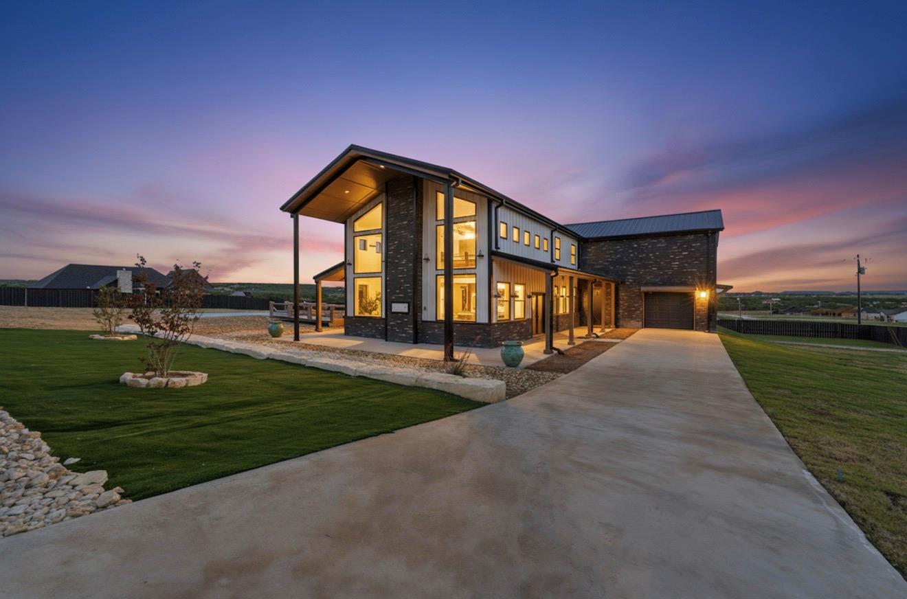 Contemporary architecture featuring a vaulted ent