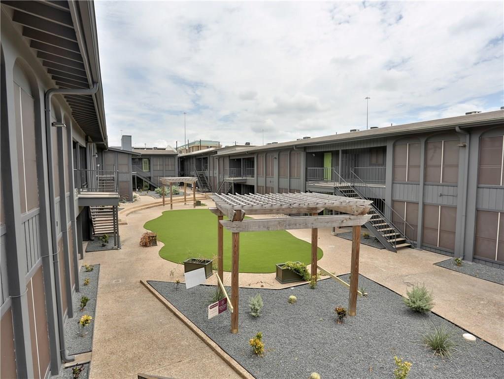 View of yard featuring stairs