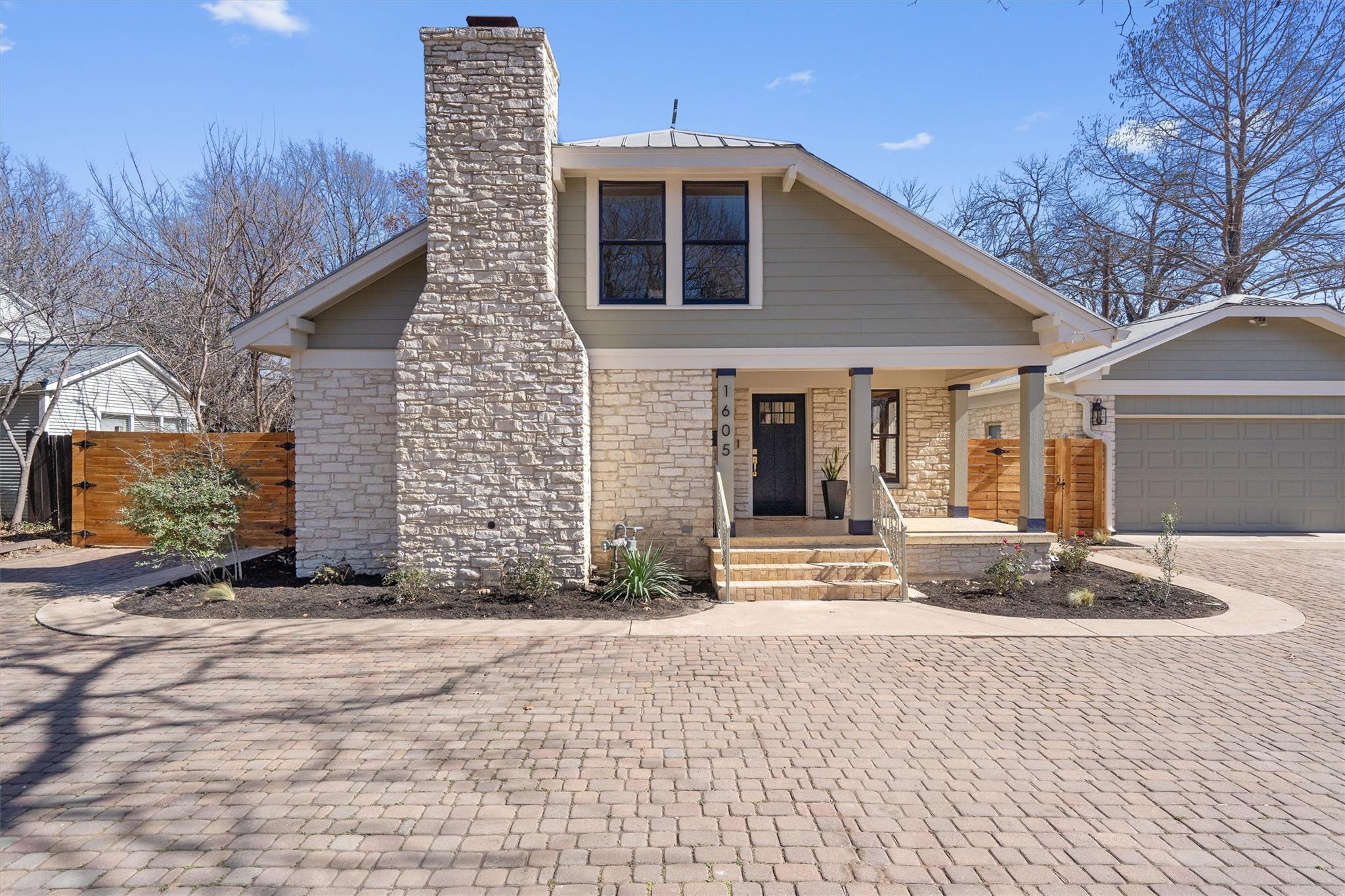 View of front of home featuring covered porch, a 