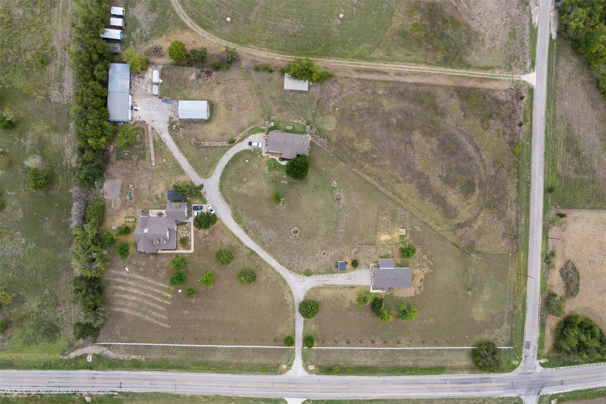 Aerial view of property's location with rural lan
