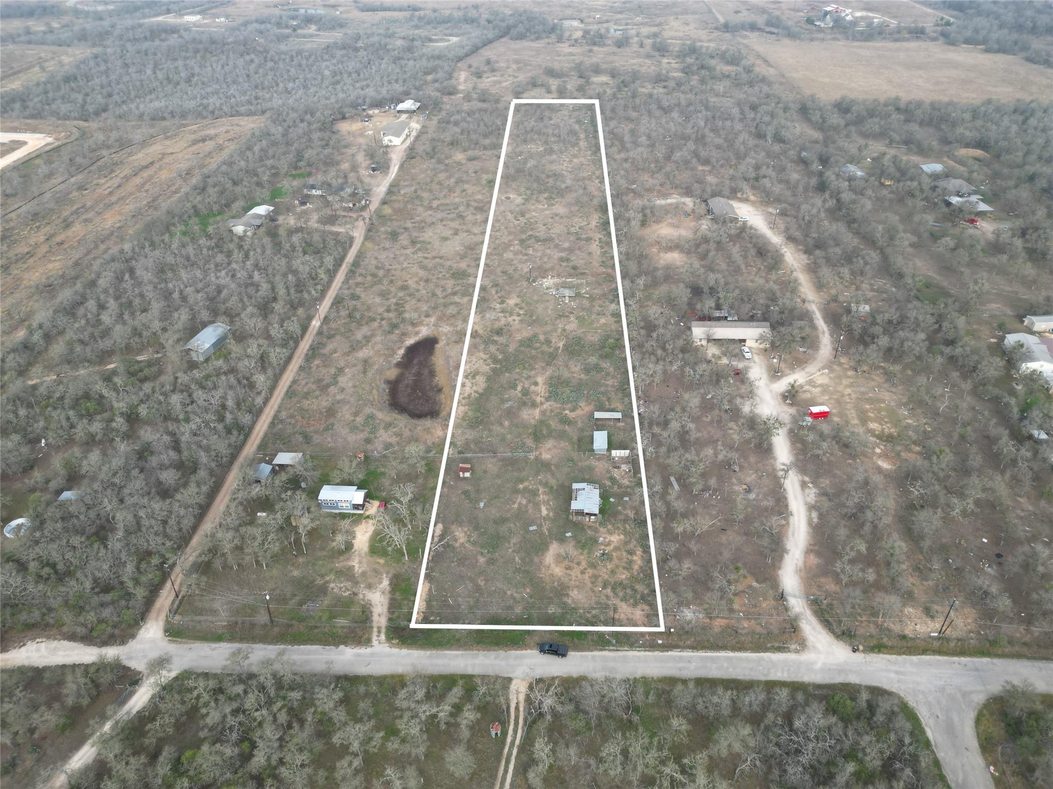 Aerial overview of property's location with prope