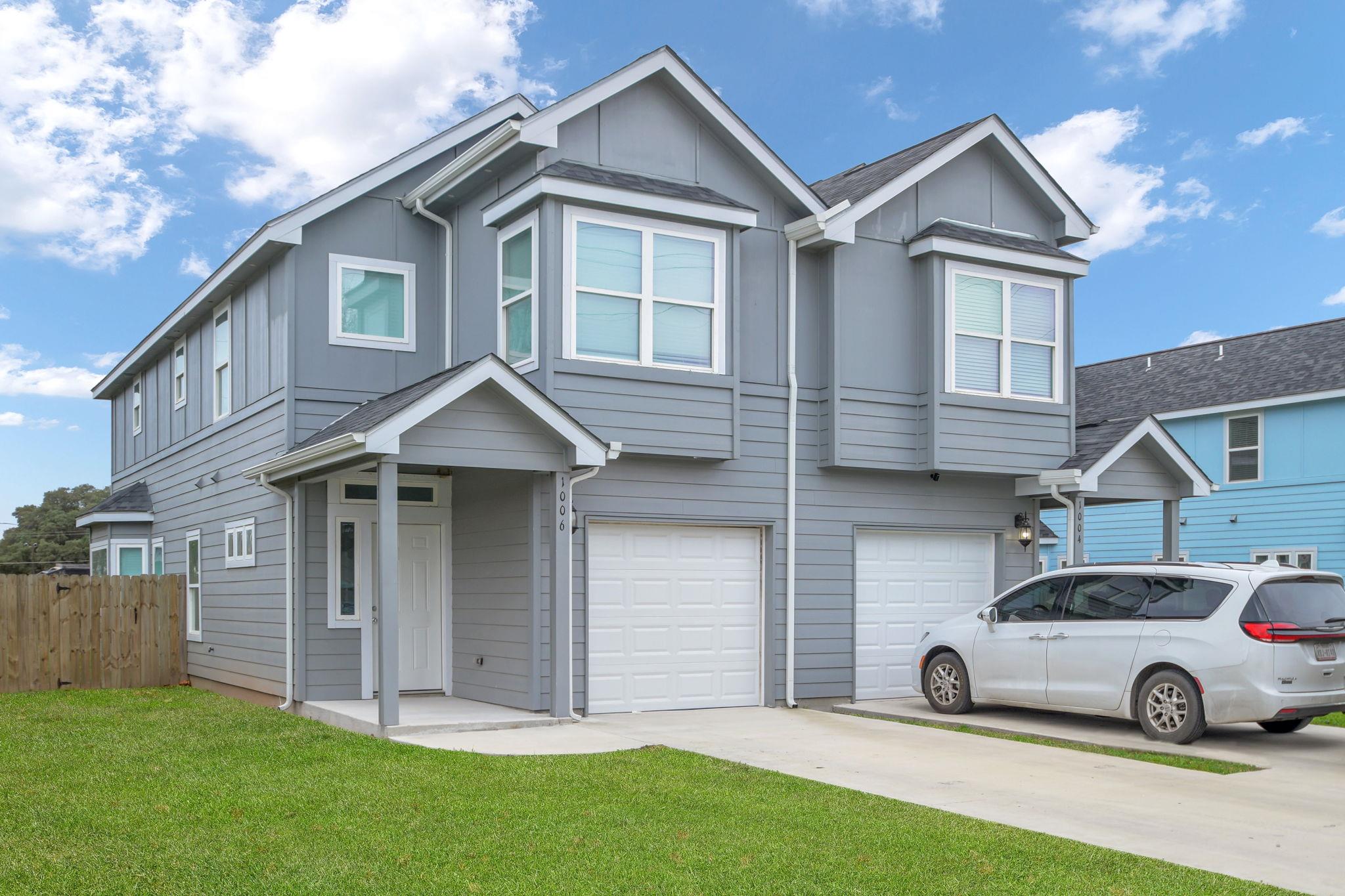 View of front of house featuring an attached gara