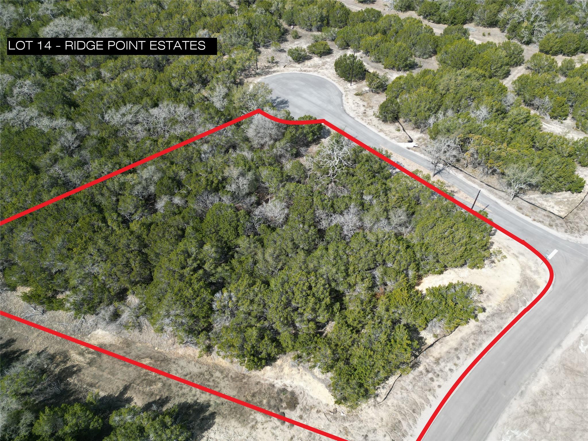 Aerial view of property and surrounding area with