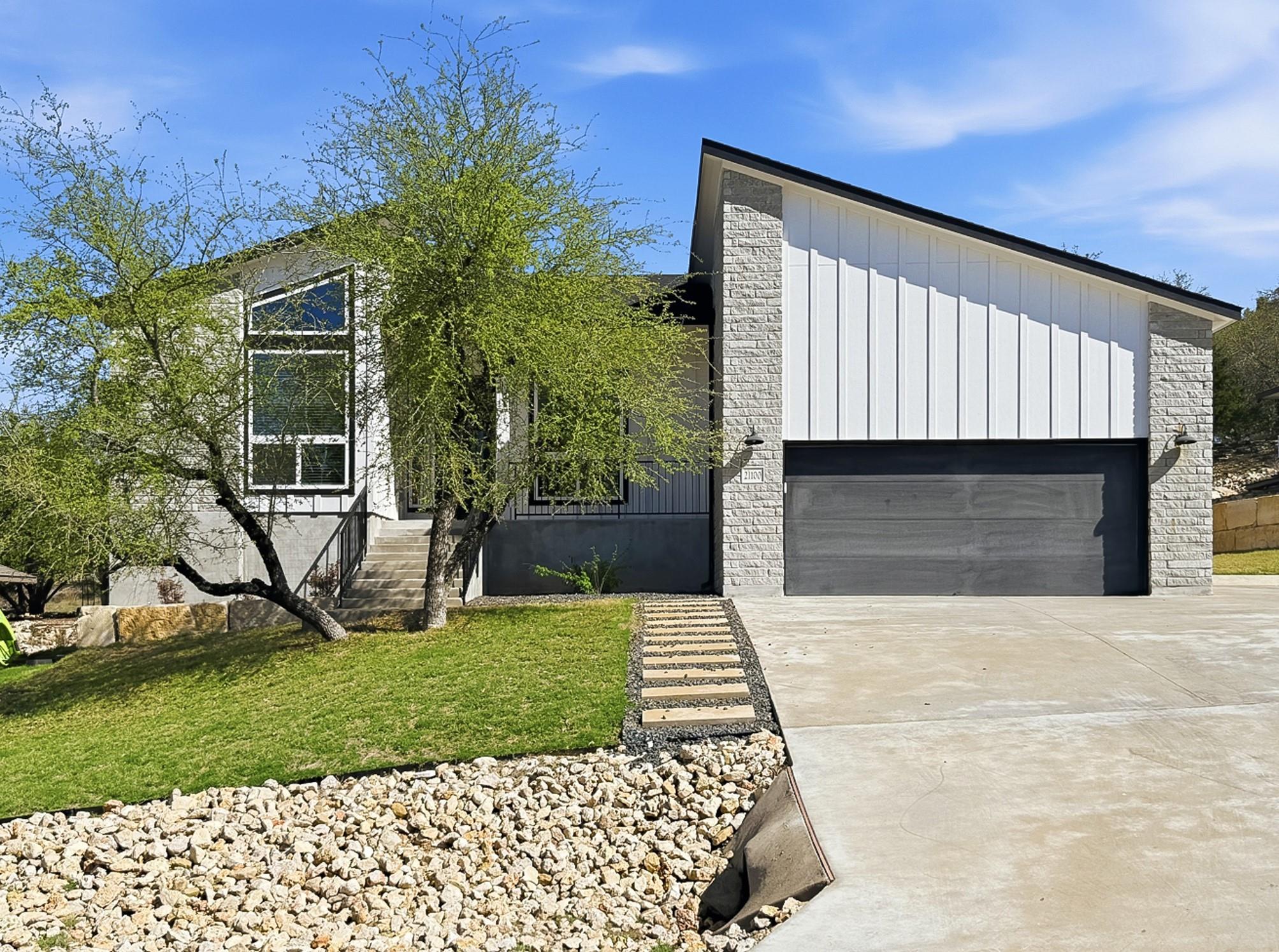 View of front of home with board and batten sidin