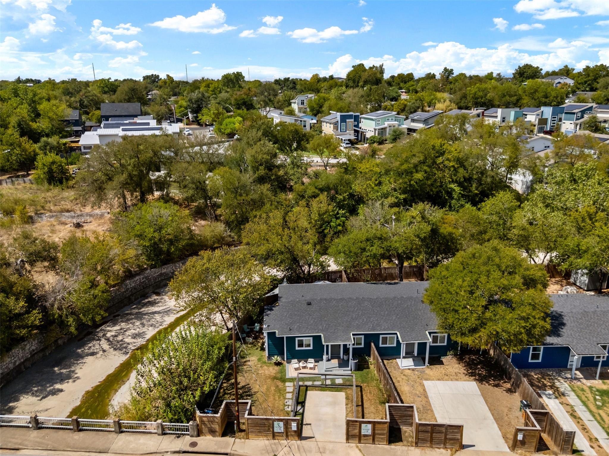 Lush mature trees surround this residential prope