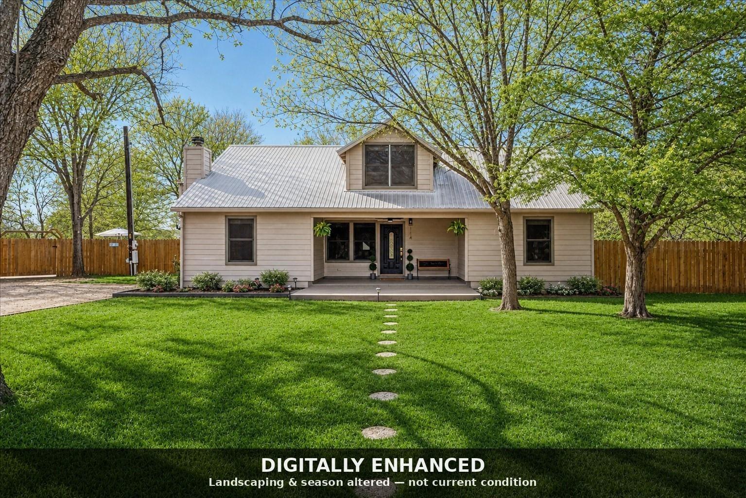 A welcoming façade boasts a covered front porch a