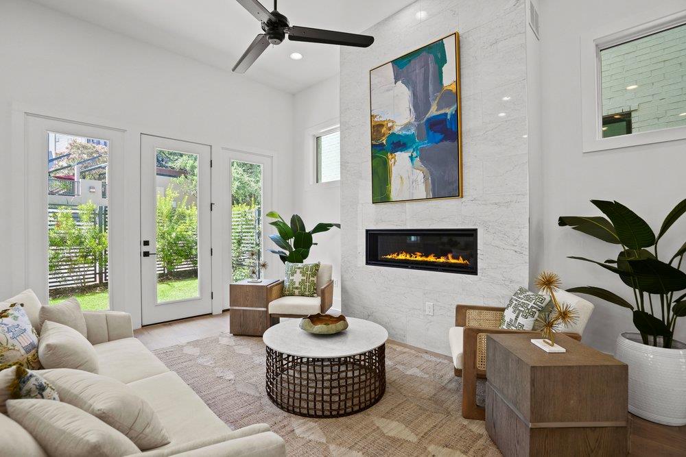 A spacious living area with outdoor access featur