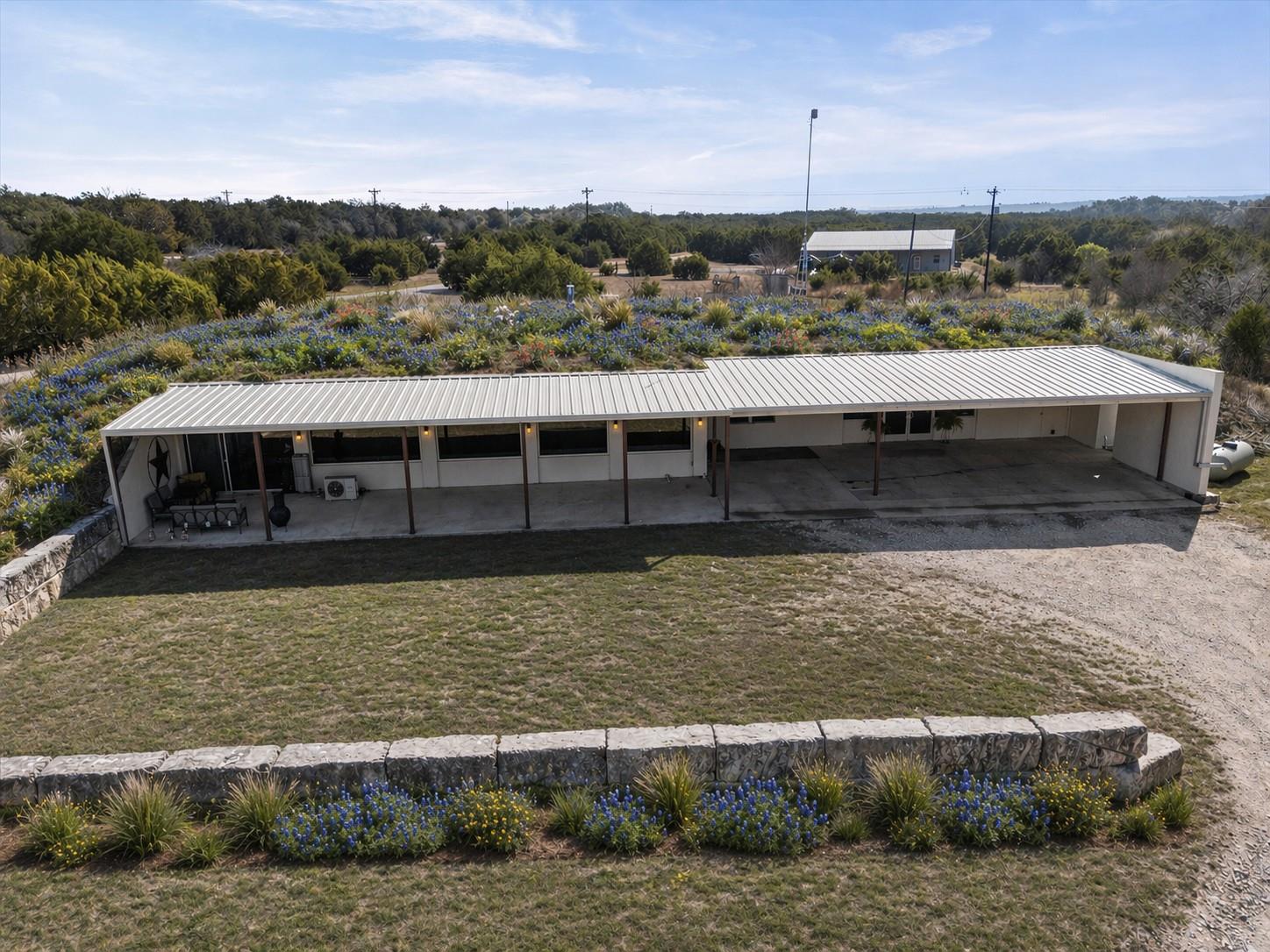 Single-story residence featuring a metal roof and