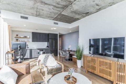 Living area with light wood-style floors