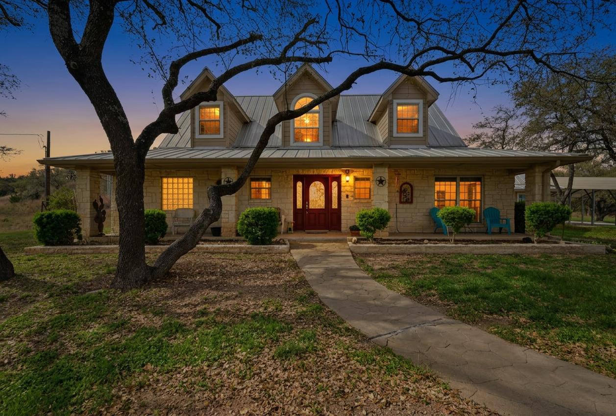 View of front of property featuring covered porch