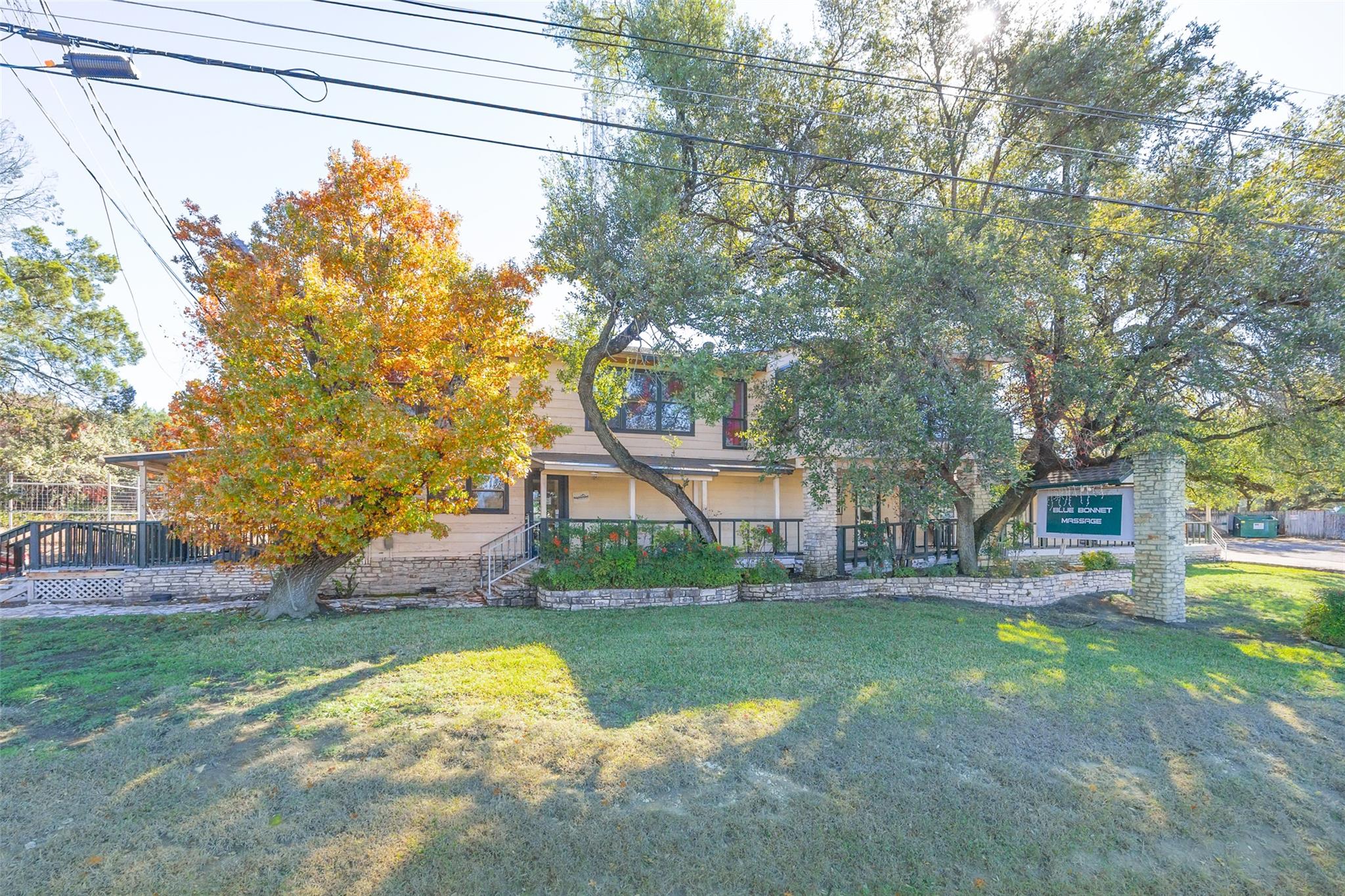 View of property hidden behind natural elements w
