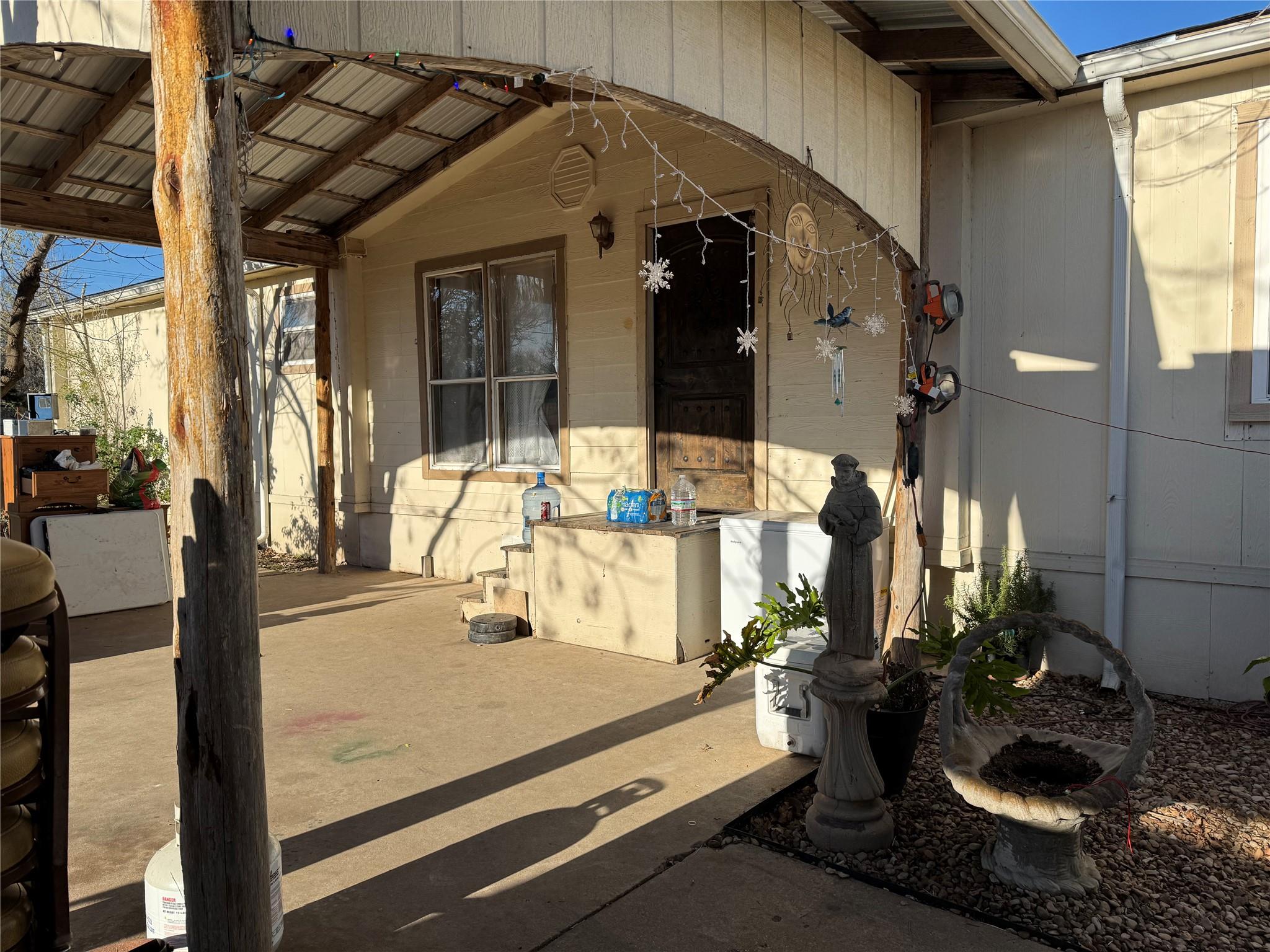Entrance to property with covered porch