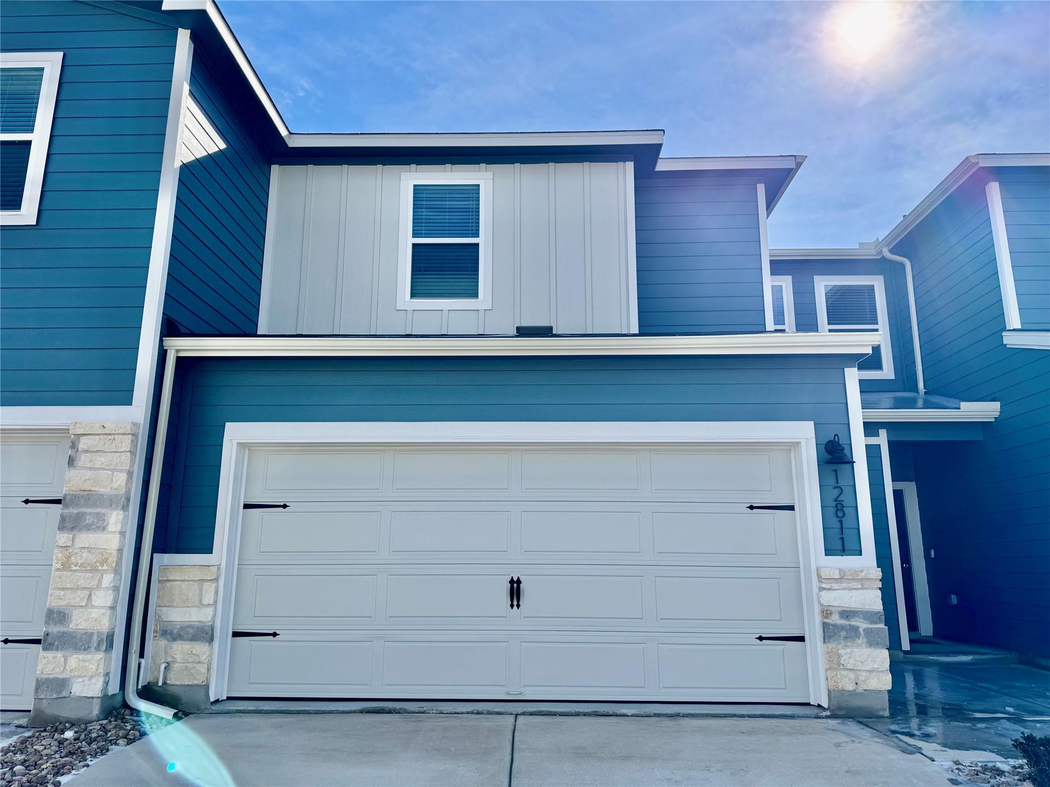 Garage with concrete driveway