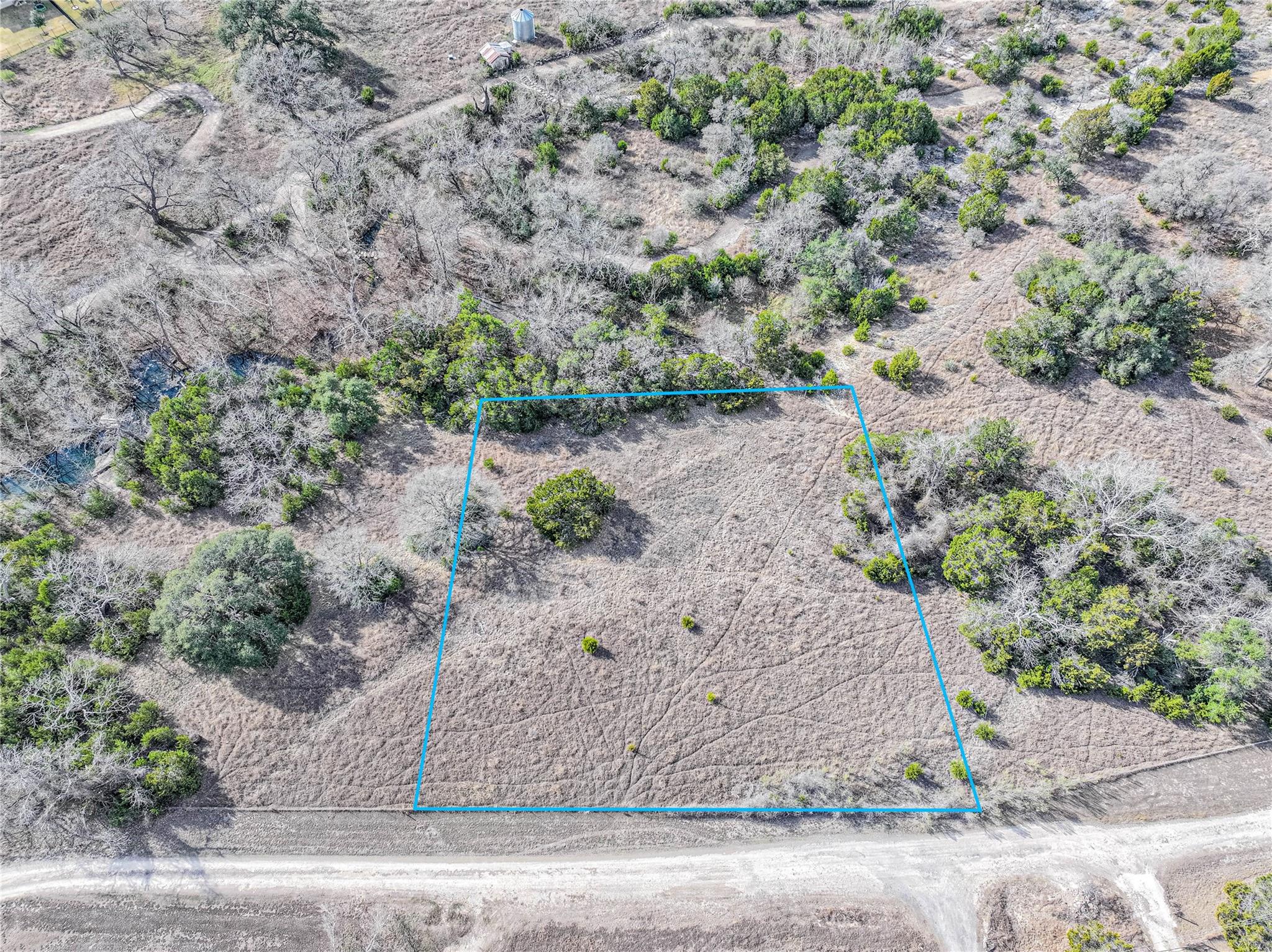 Aerial view of sparsely populated area with prope
