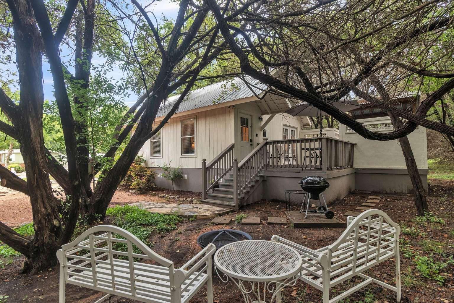 Back of property with a wooden deck