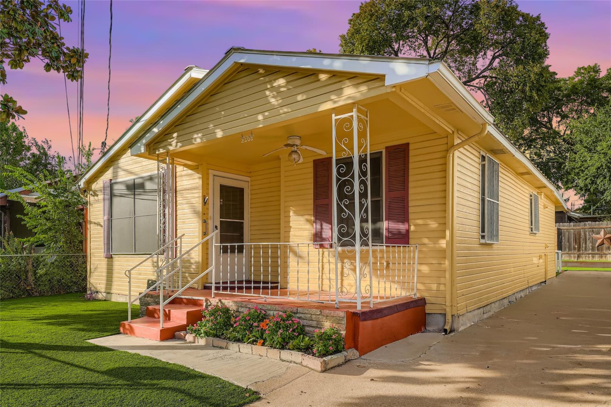 View of front of home featuring a porch and a cei