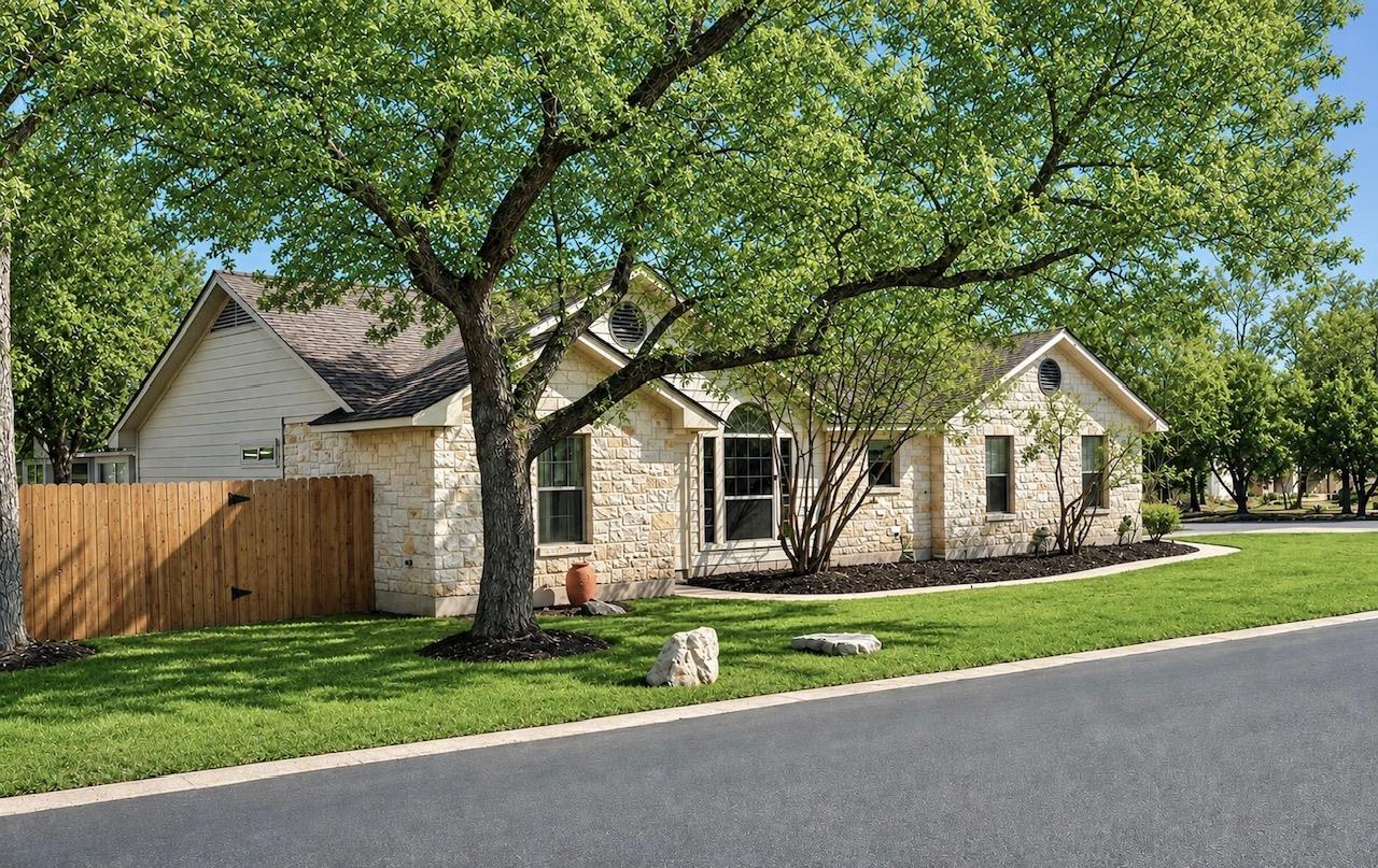 A classic stone facade home awaits, featuring mat