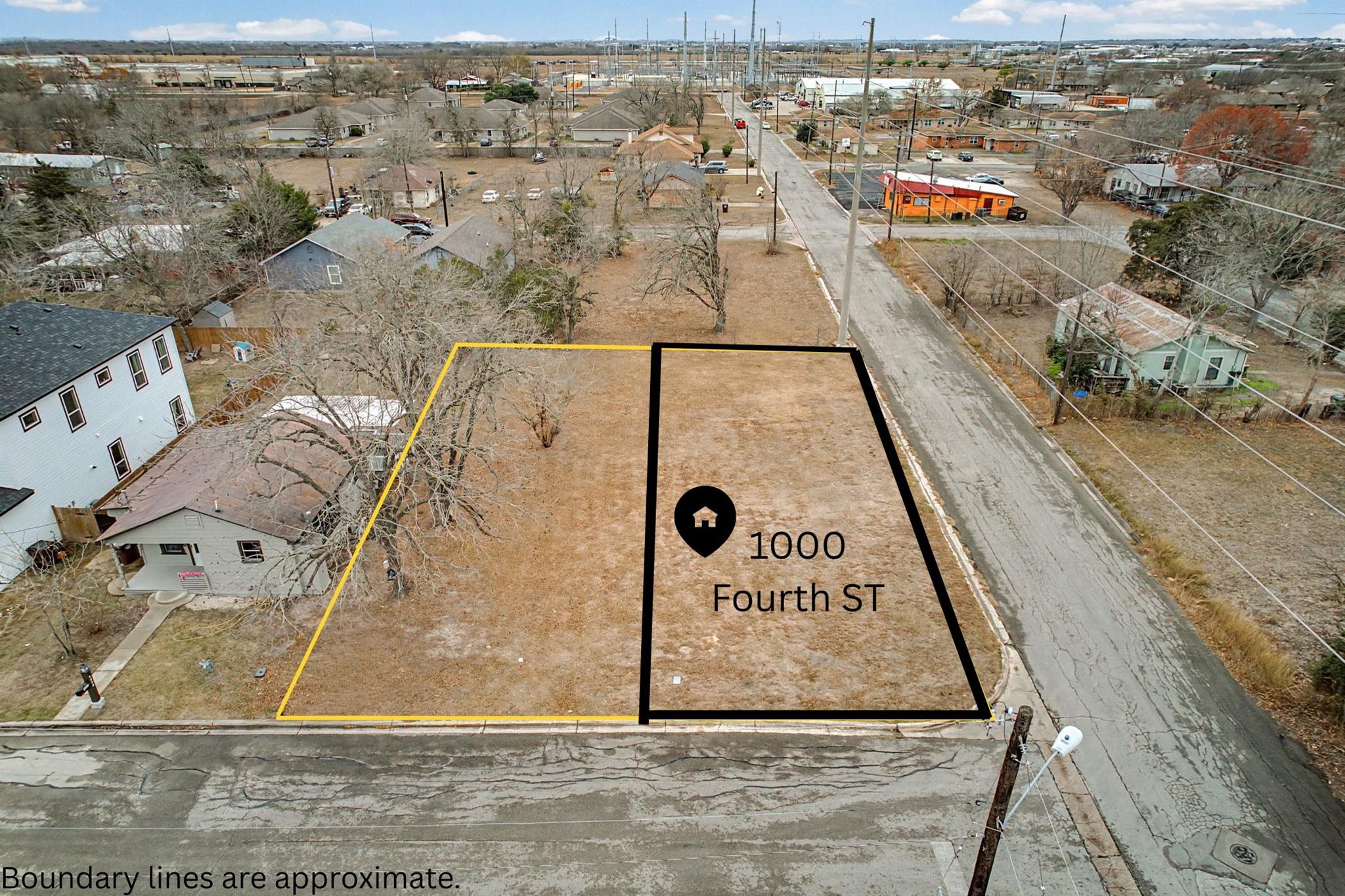Aerial perspective of suburban area with property