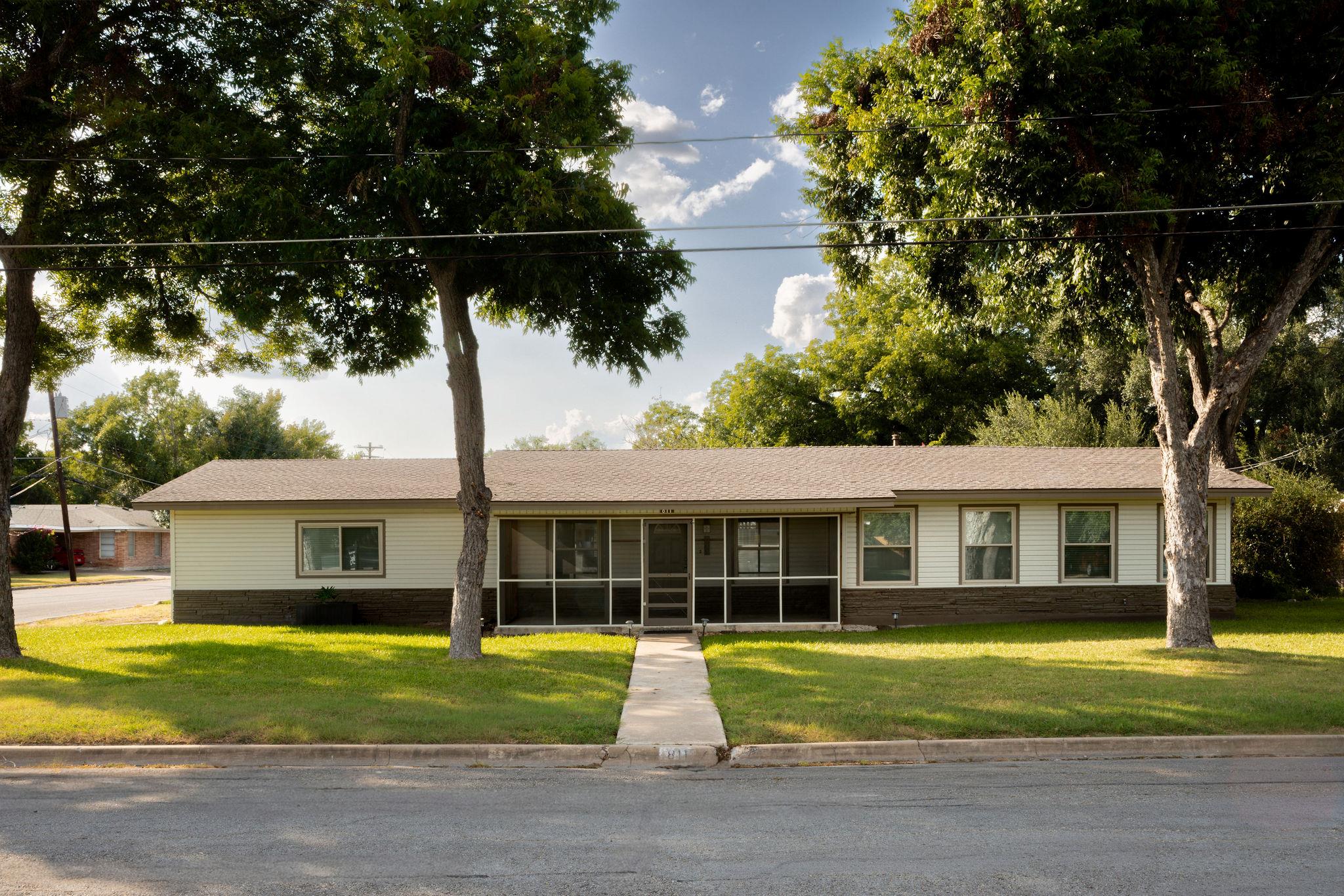 A classic ranch home presents with a welcoming sc
