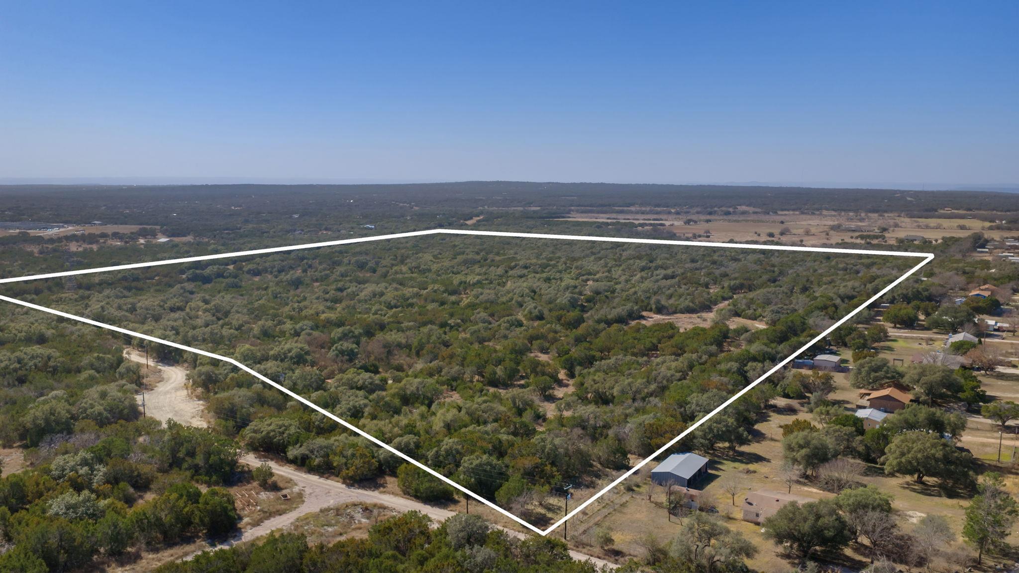 Aerial view of property and surrounding area feat