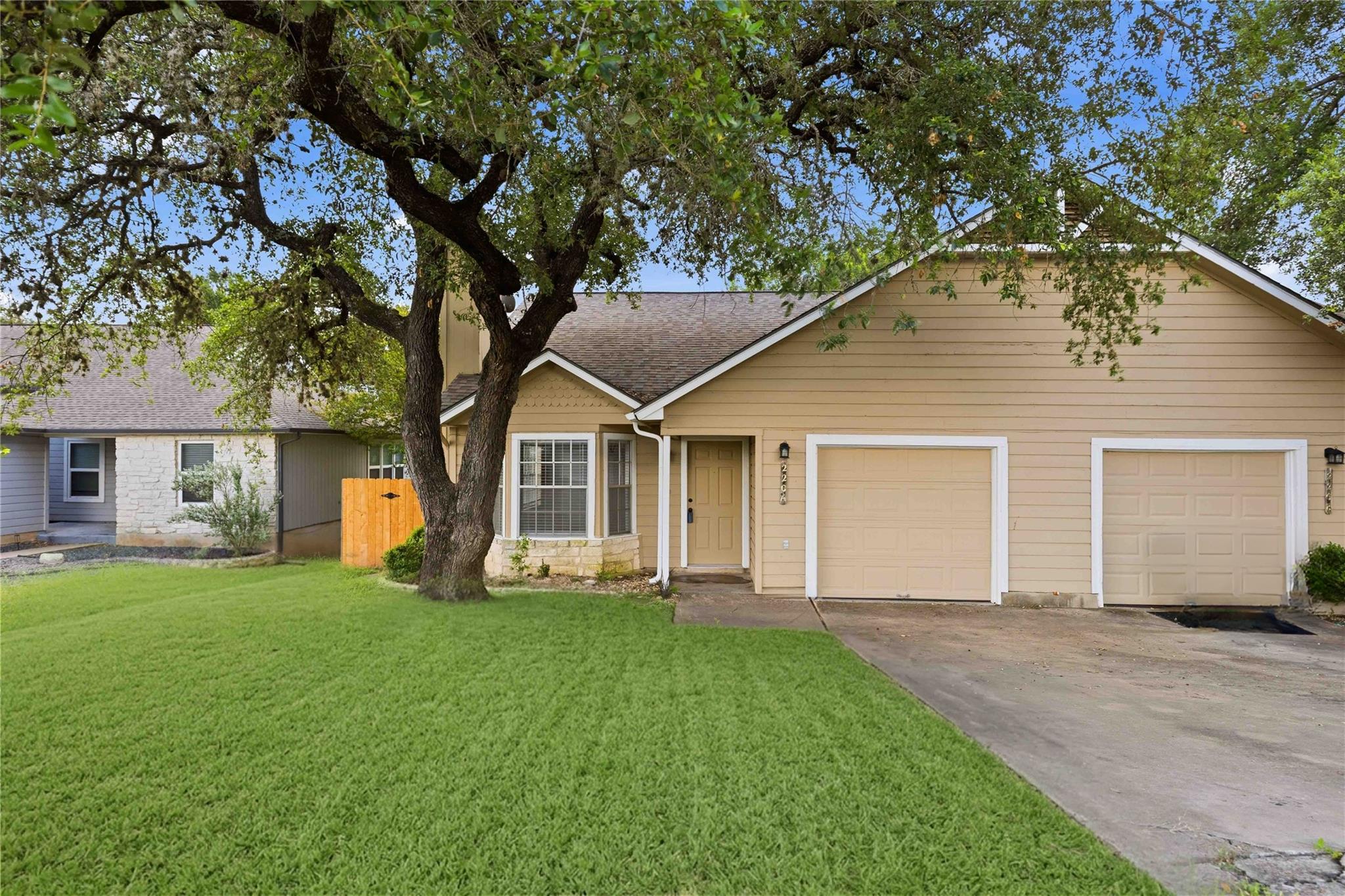 A welcoming front exterior showcasing a lush lawn