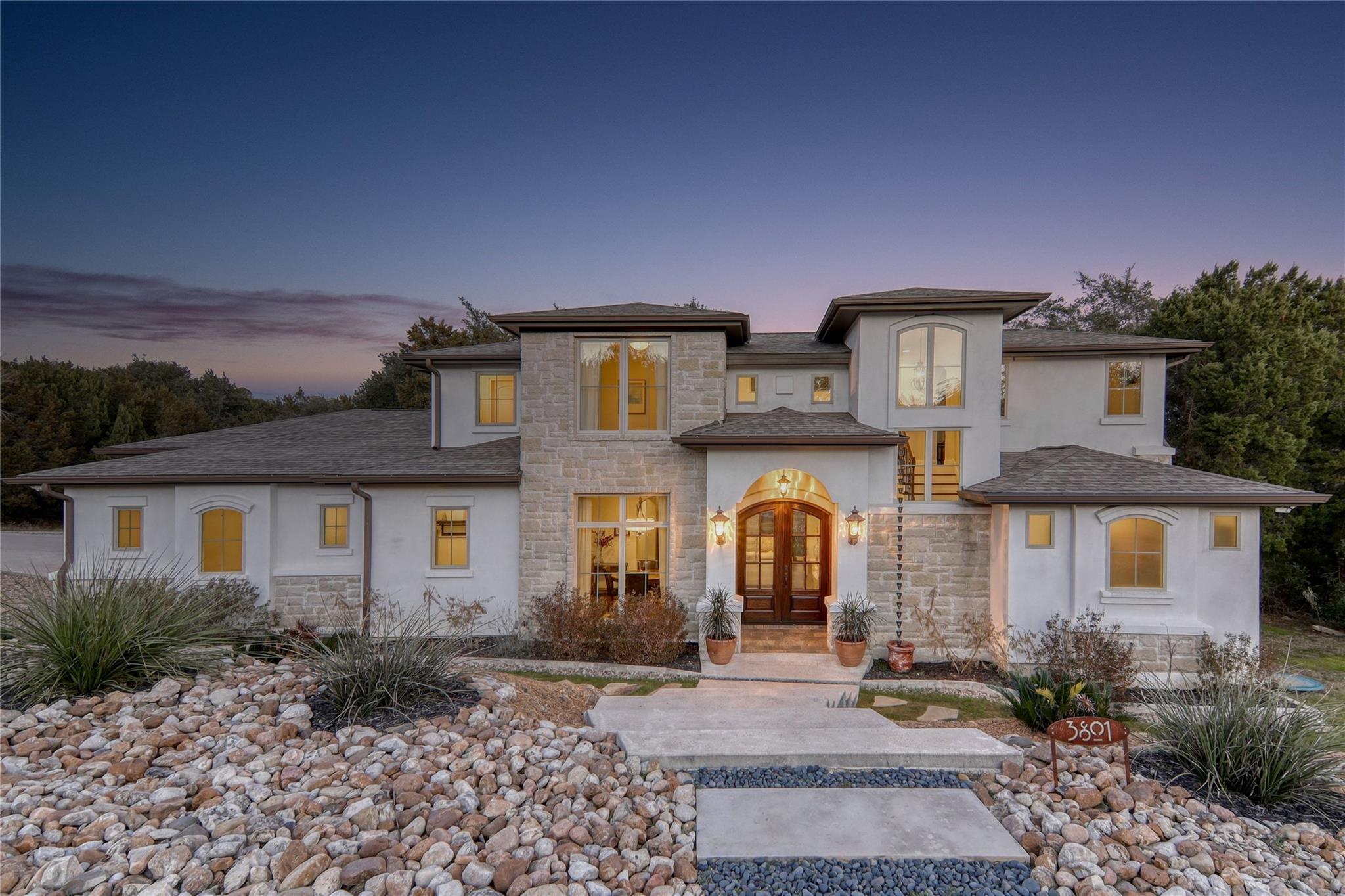 View of front of house featuring french doors, st
